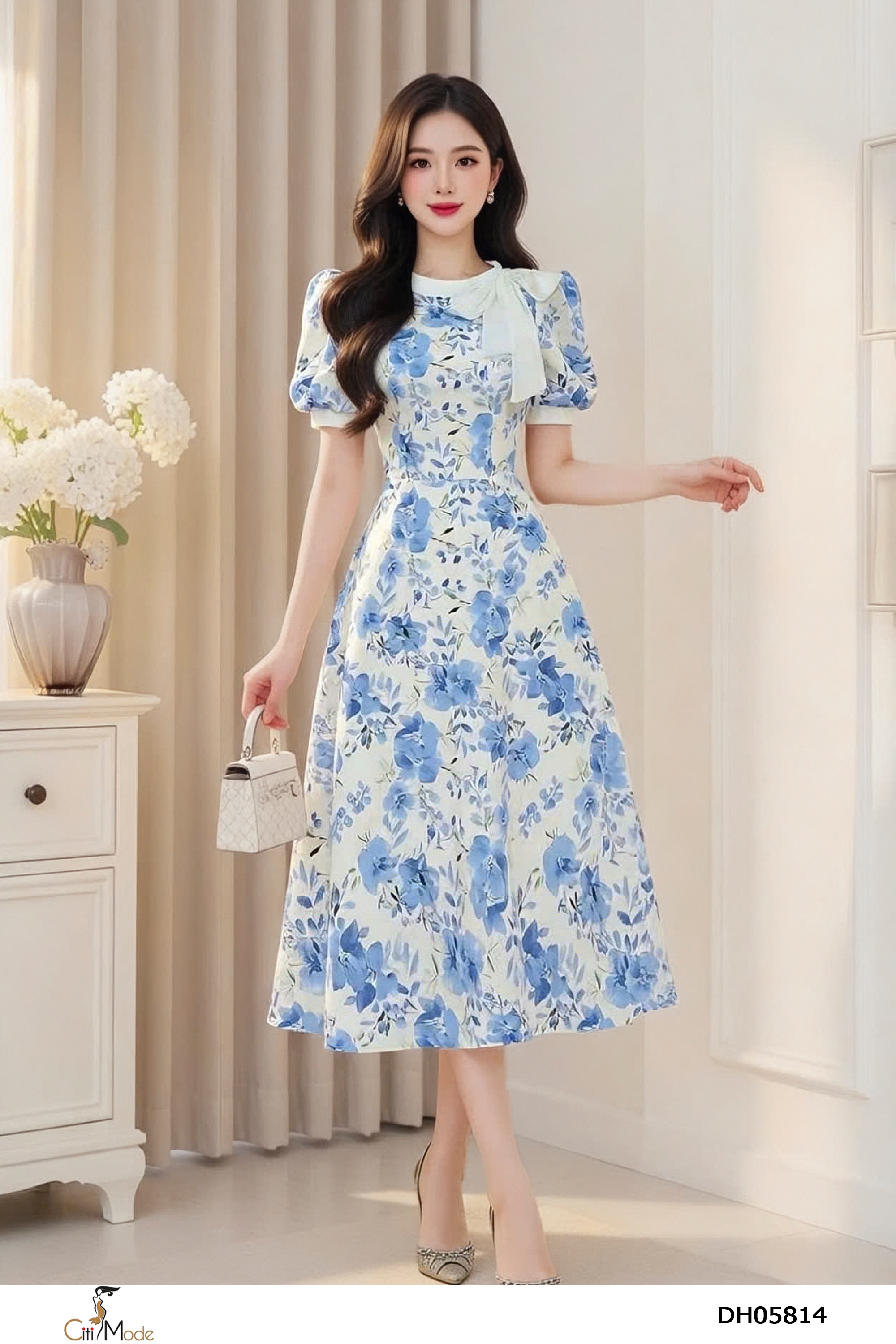 Đầm xòe hoa xanh cổ phối nơ tay cọc