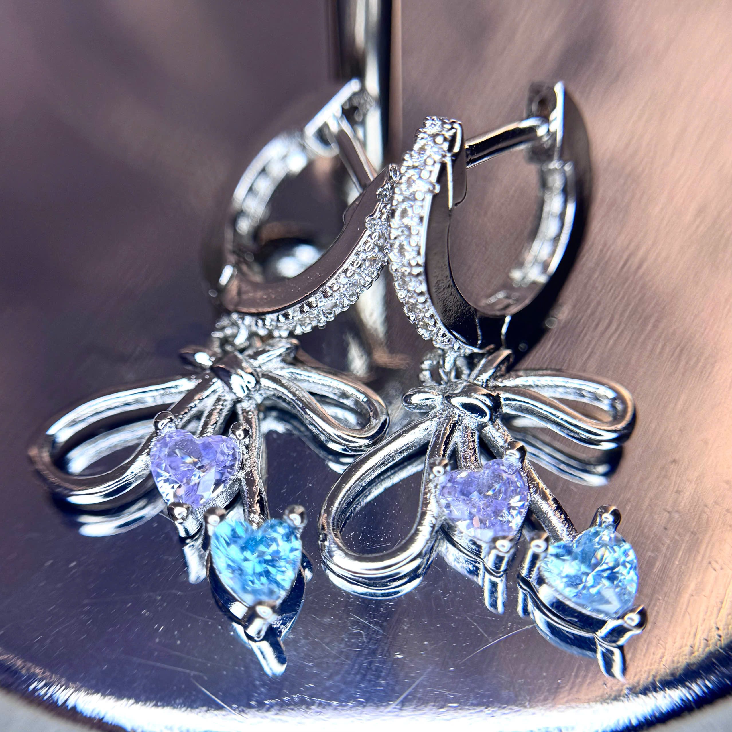 Khuyên vòng kiểu nơ rơi đá xanh tím size 10_thumbnail_2