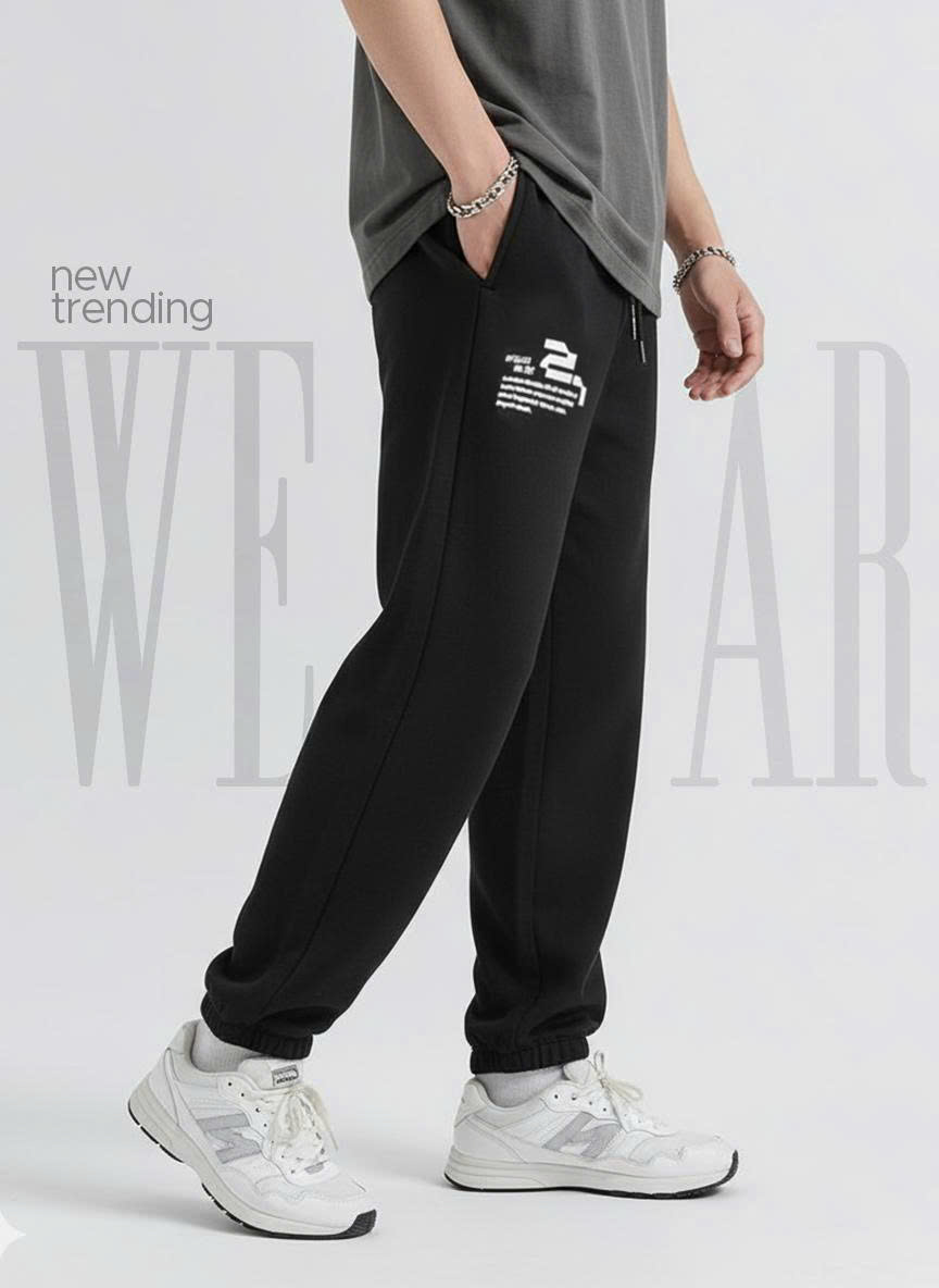 Quần nỉ bé trai màu đen chun gấu