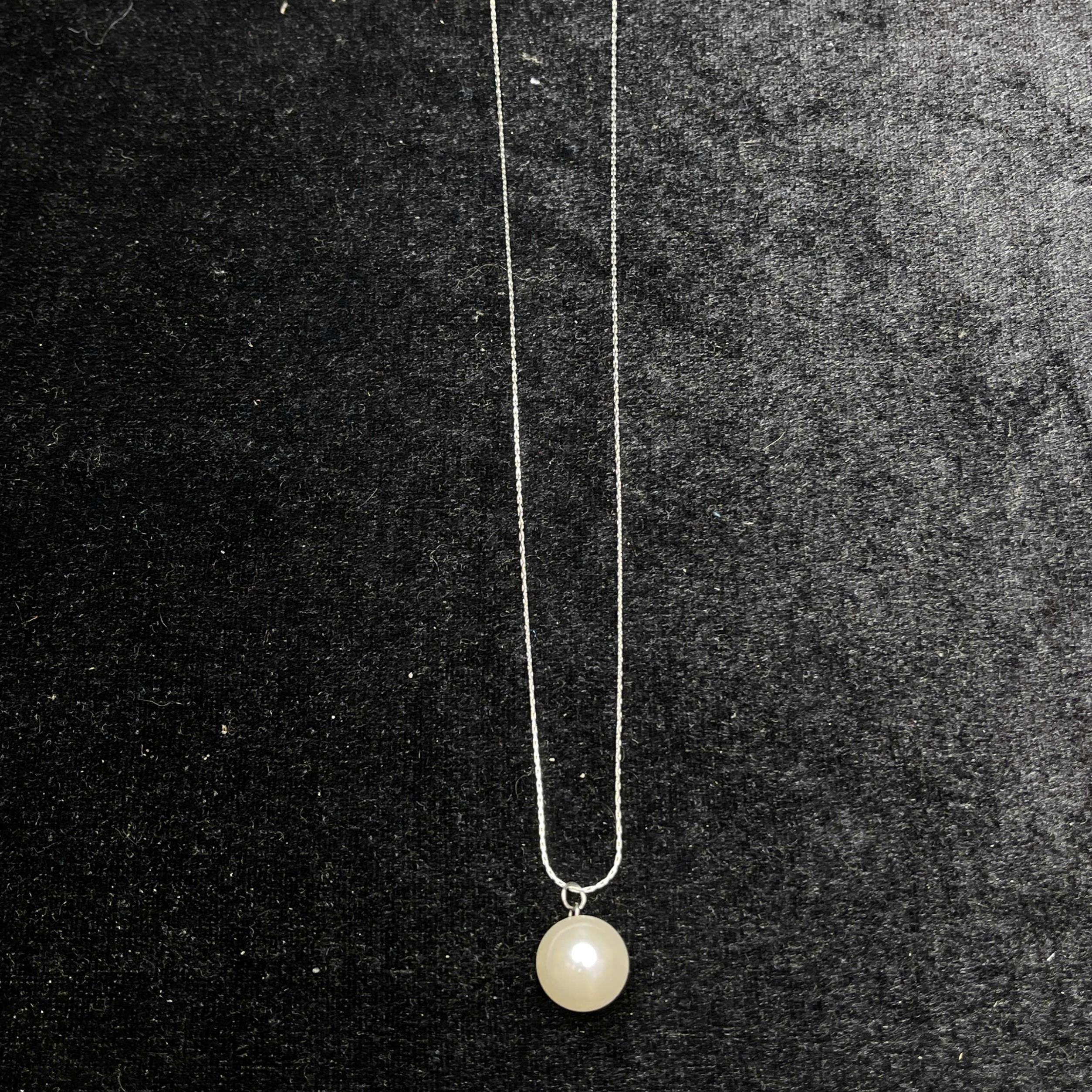 vòng cổ titan thép ngọc trai trắng 