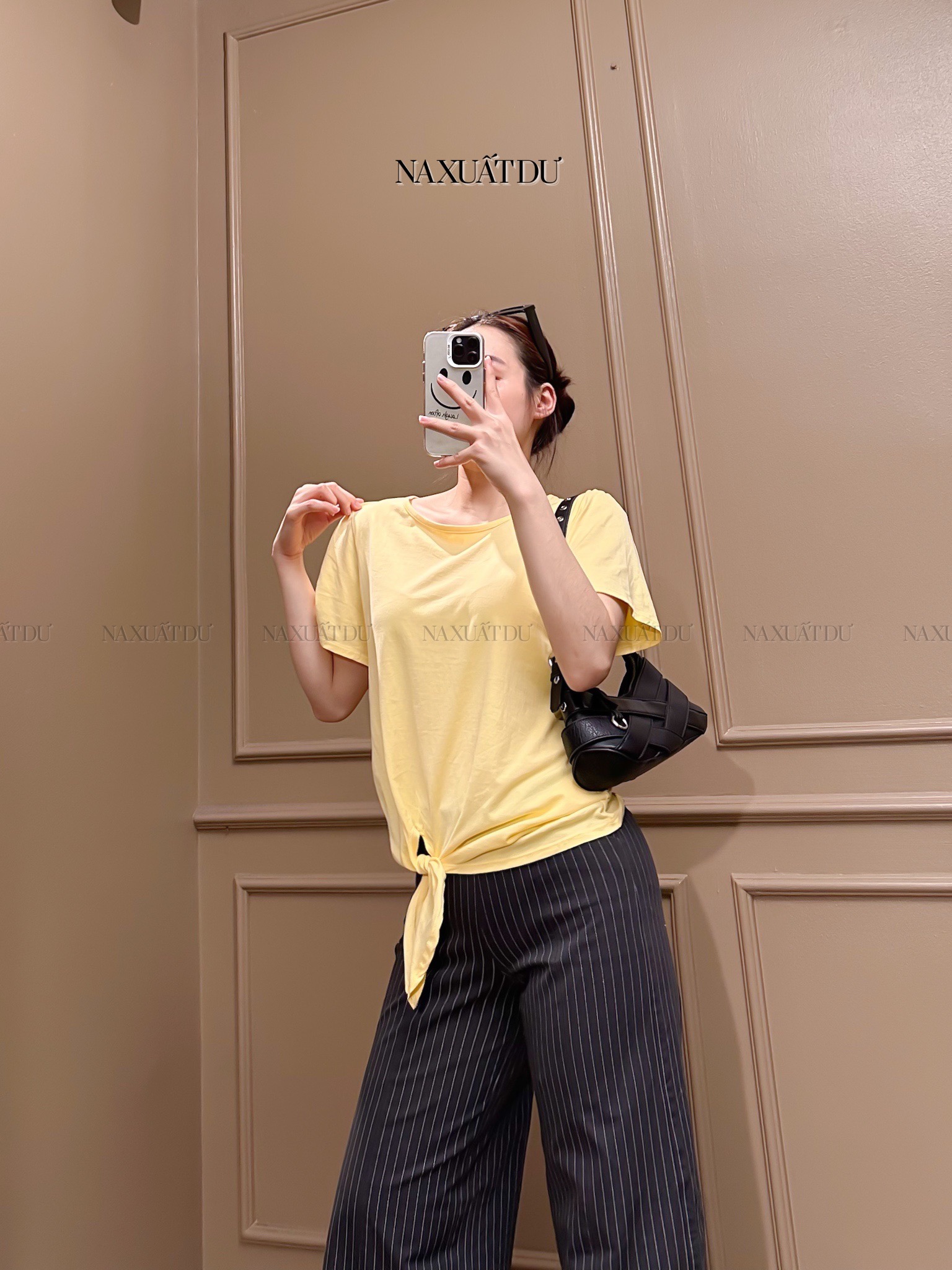 Áo thun cột dây màu vàng nữ 