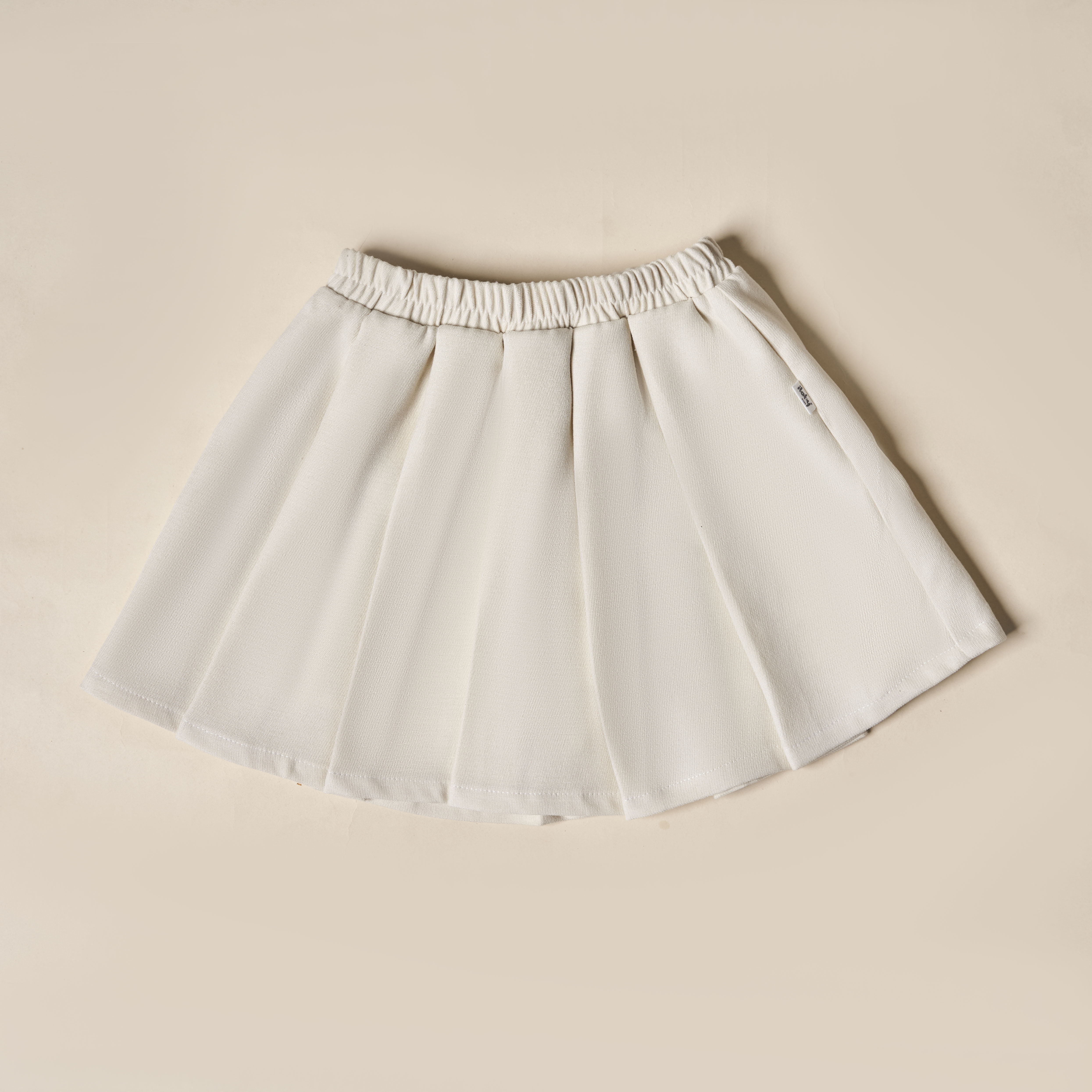 Chân váy nhung xếp ly