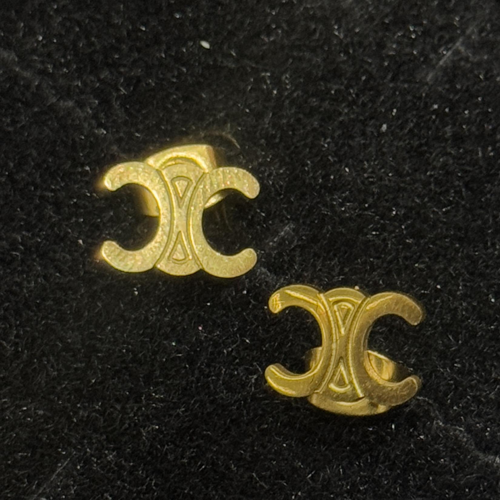 khuyên kiểu cặp titan vàng logo Chanel_thumbnail_1