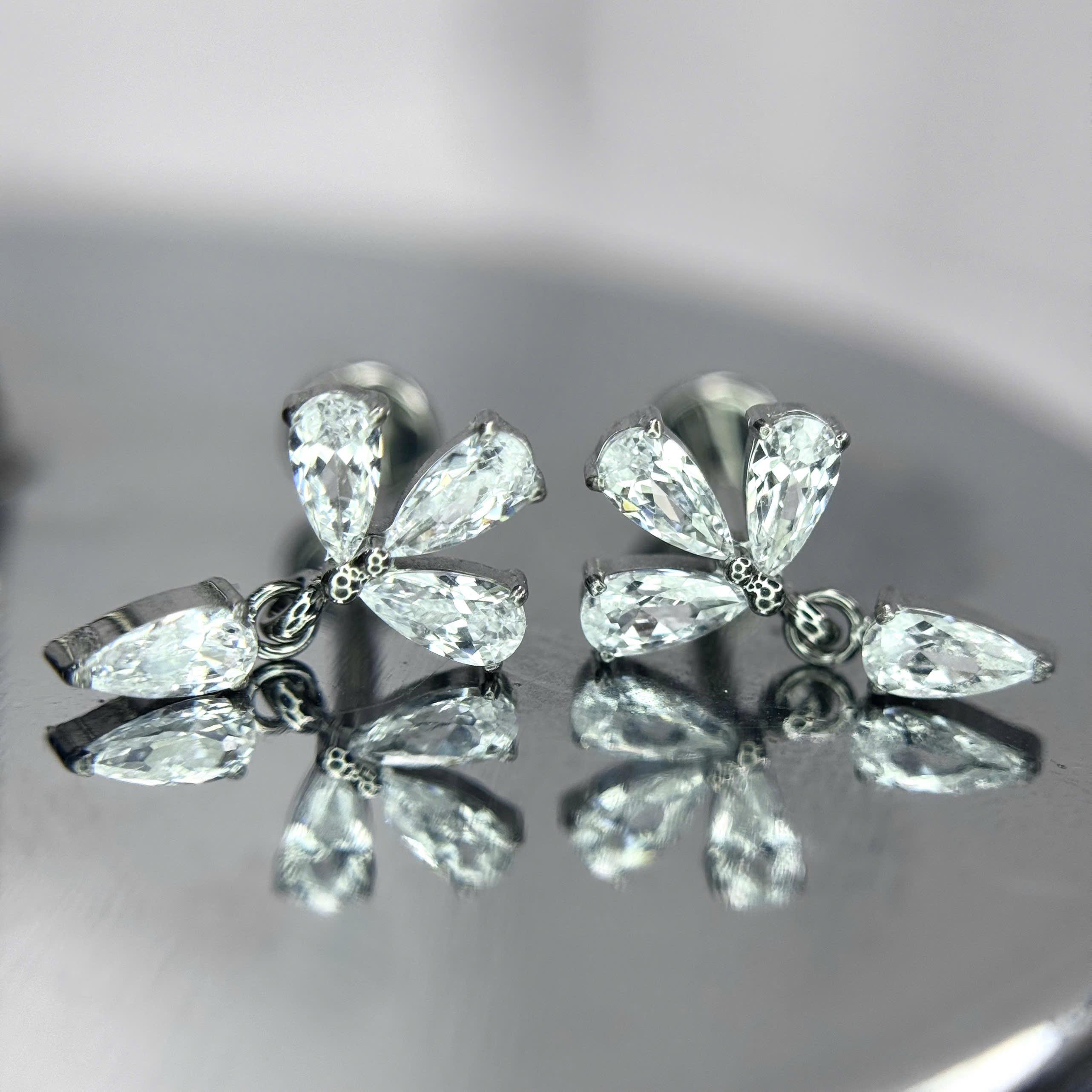 Khuyên kiểu titan 3 đá lớn rơi_thumbnail_1