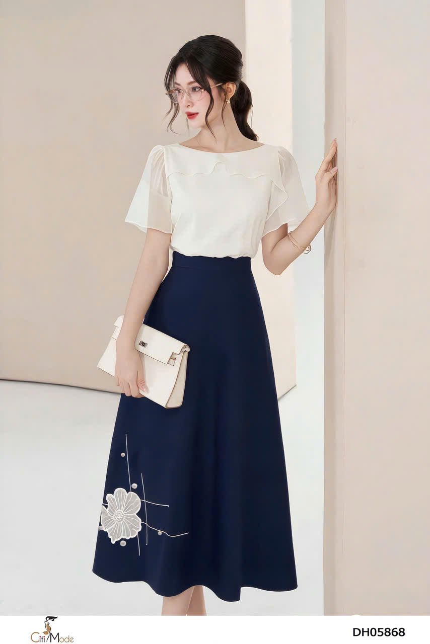 Đầm xòe tím than phối tơ kem đính hoa laser