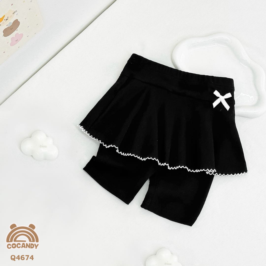 Quần váy legging lửng ĐEN viền sóng phối nơ nhỏ