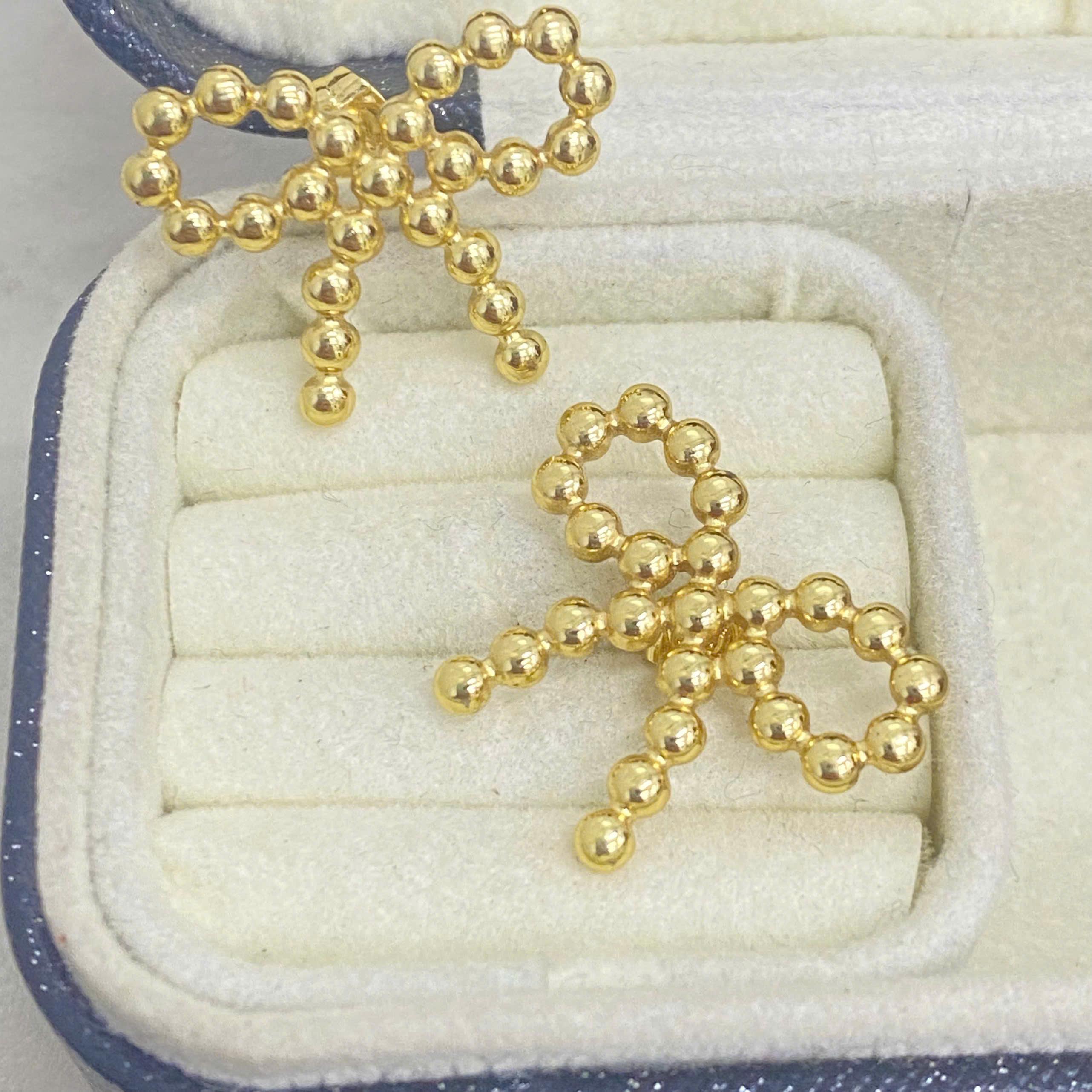 khuyên kiểu cặp vàng nơ to titan _thumbnail_2