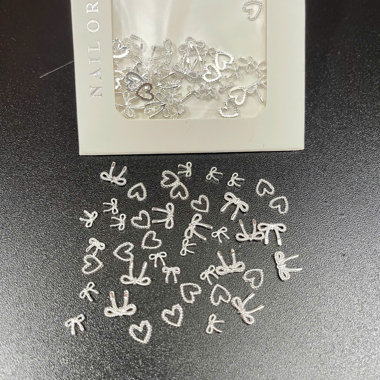 Túi charm nơ bạc tim - ms 04