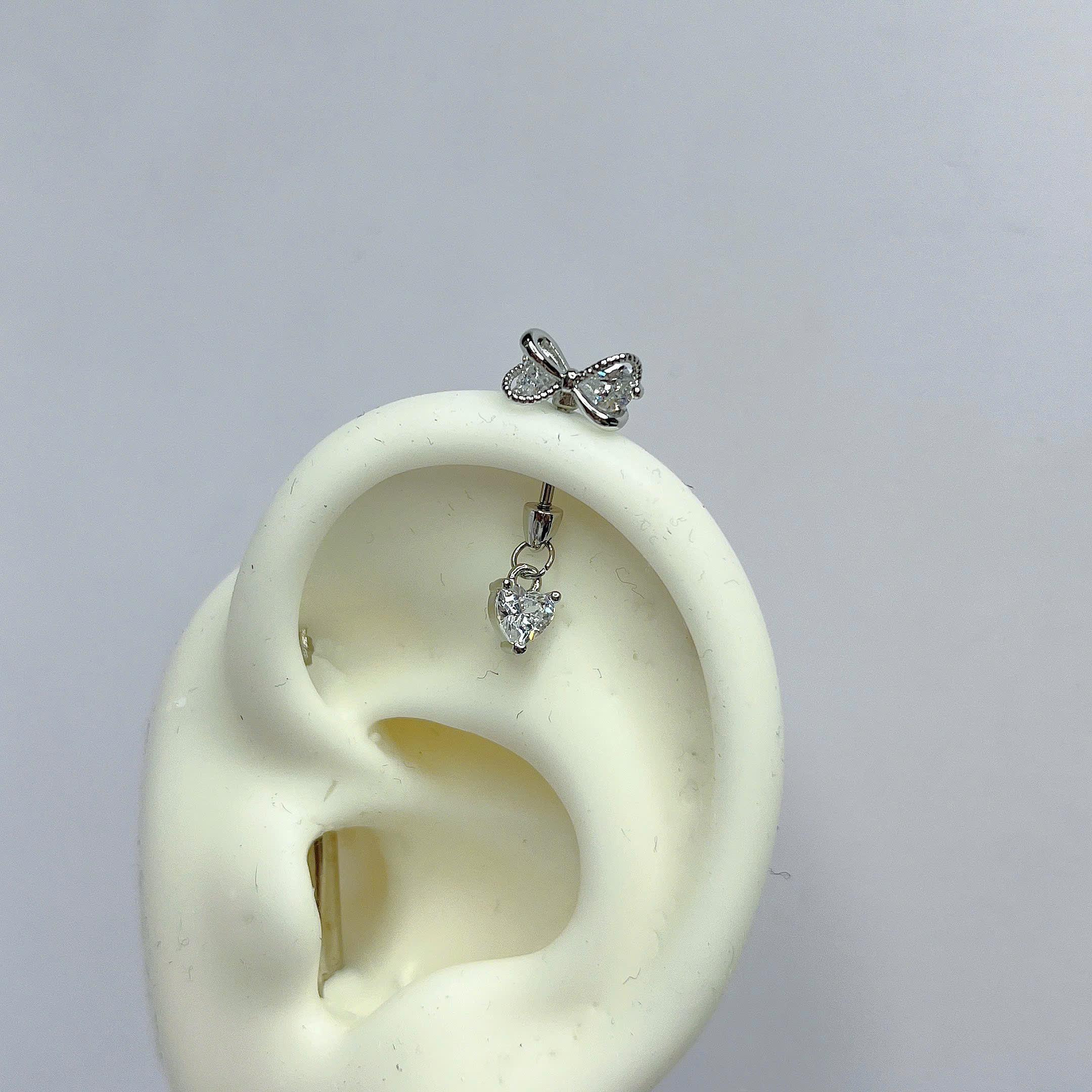 Khuyên kiểu vertical nơ trắng