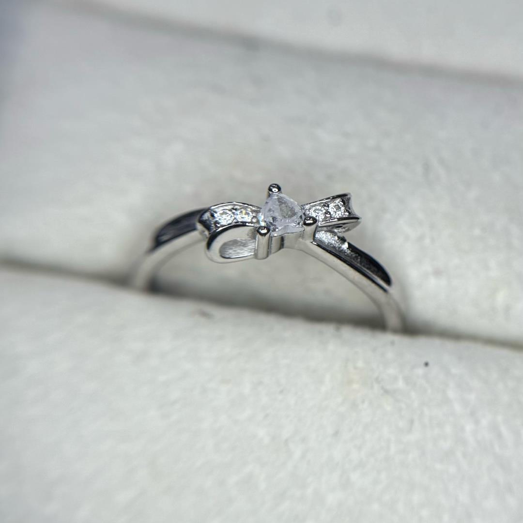 nhẫn cặp bạc si bạch kim nơ kim cương cách điệu và xoắn chéo freesize_thumbnail_2