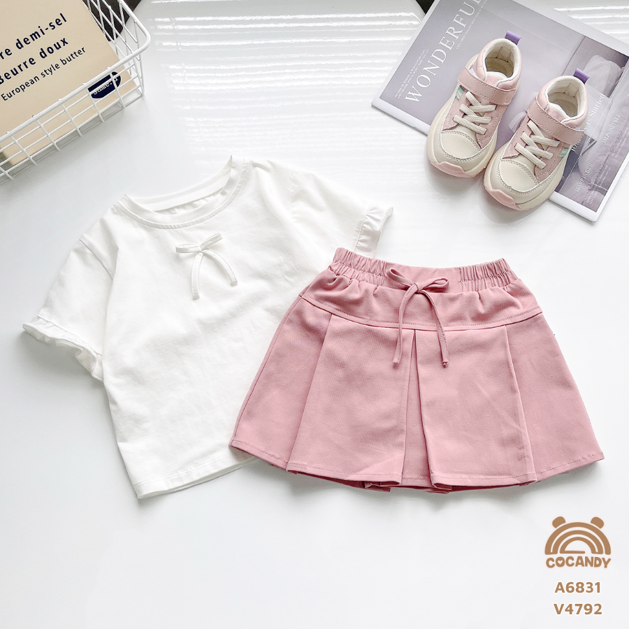 Chân váy HỒNG xếp ly phối nơ