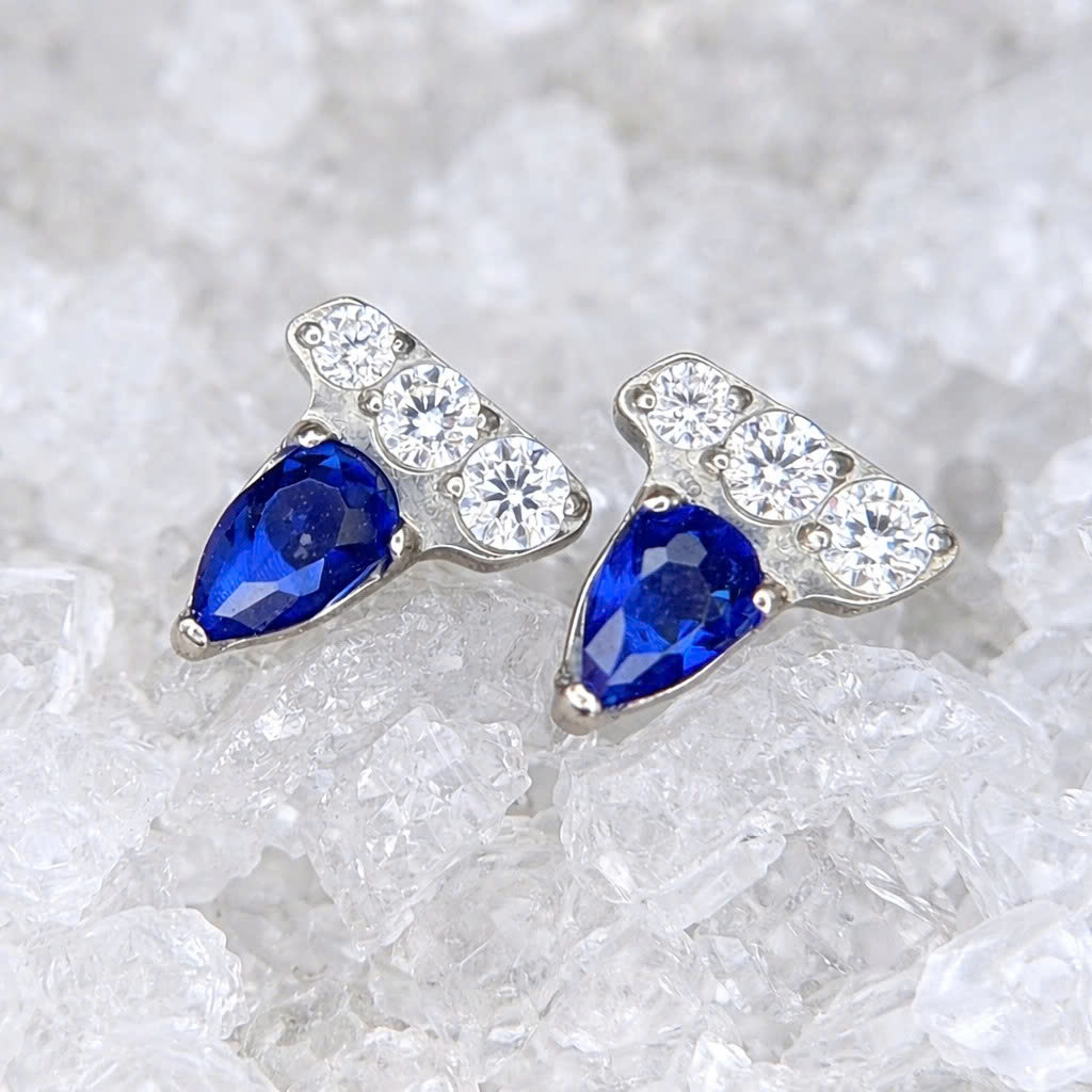 Khuyên kiểu titan đá xanh 3 đá trắng ngang_thumbnail_2