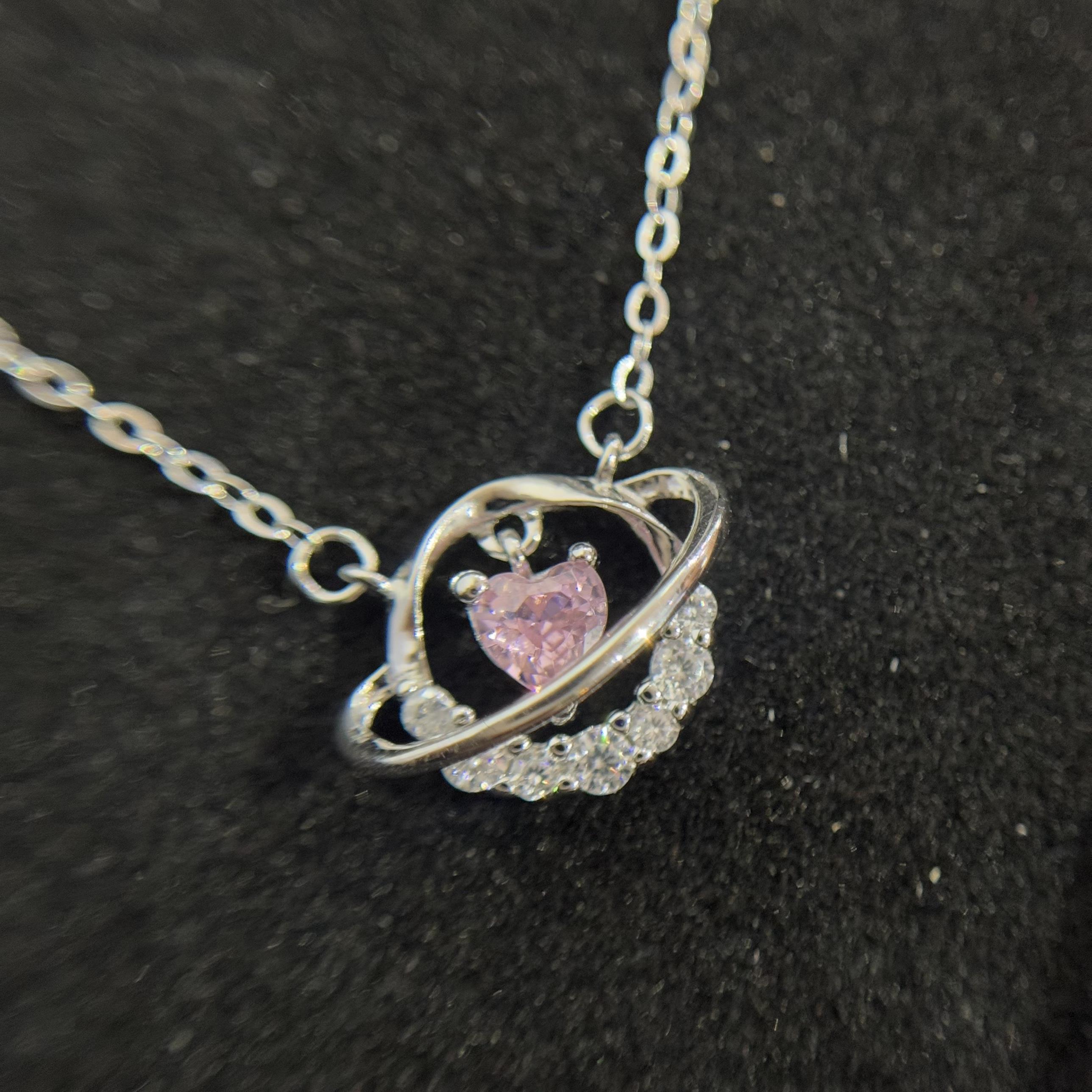 Vòng cổ bạc xi kim trái tim hồng vũ trụ