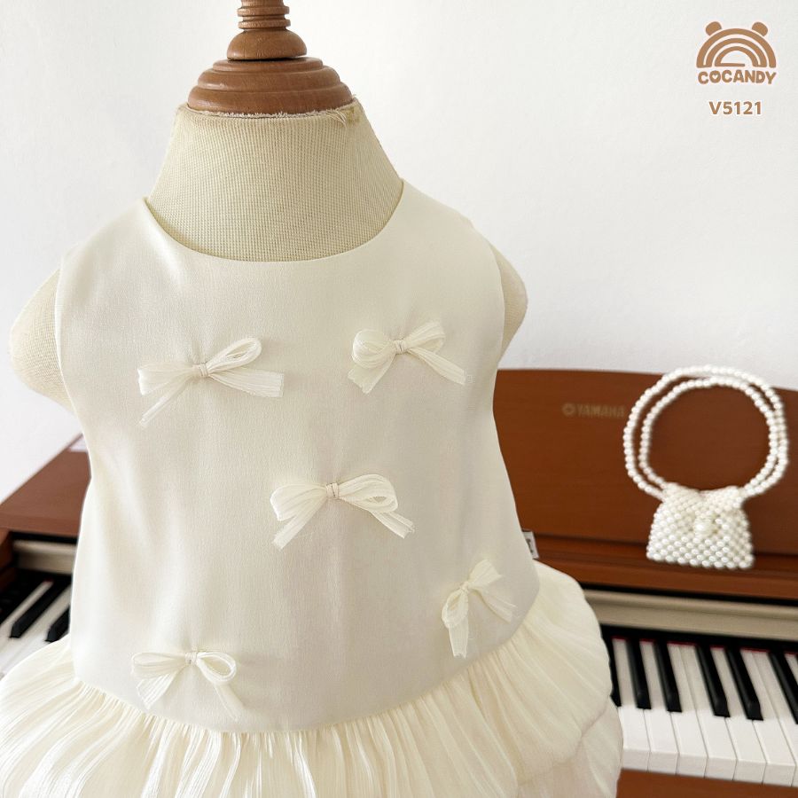 Váy cộc BE 2 tầng tơ óng đính nơ_thumbnail_3