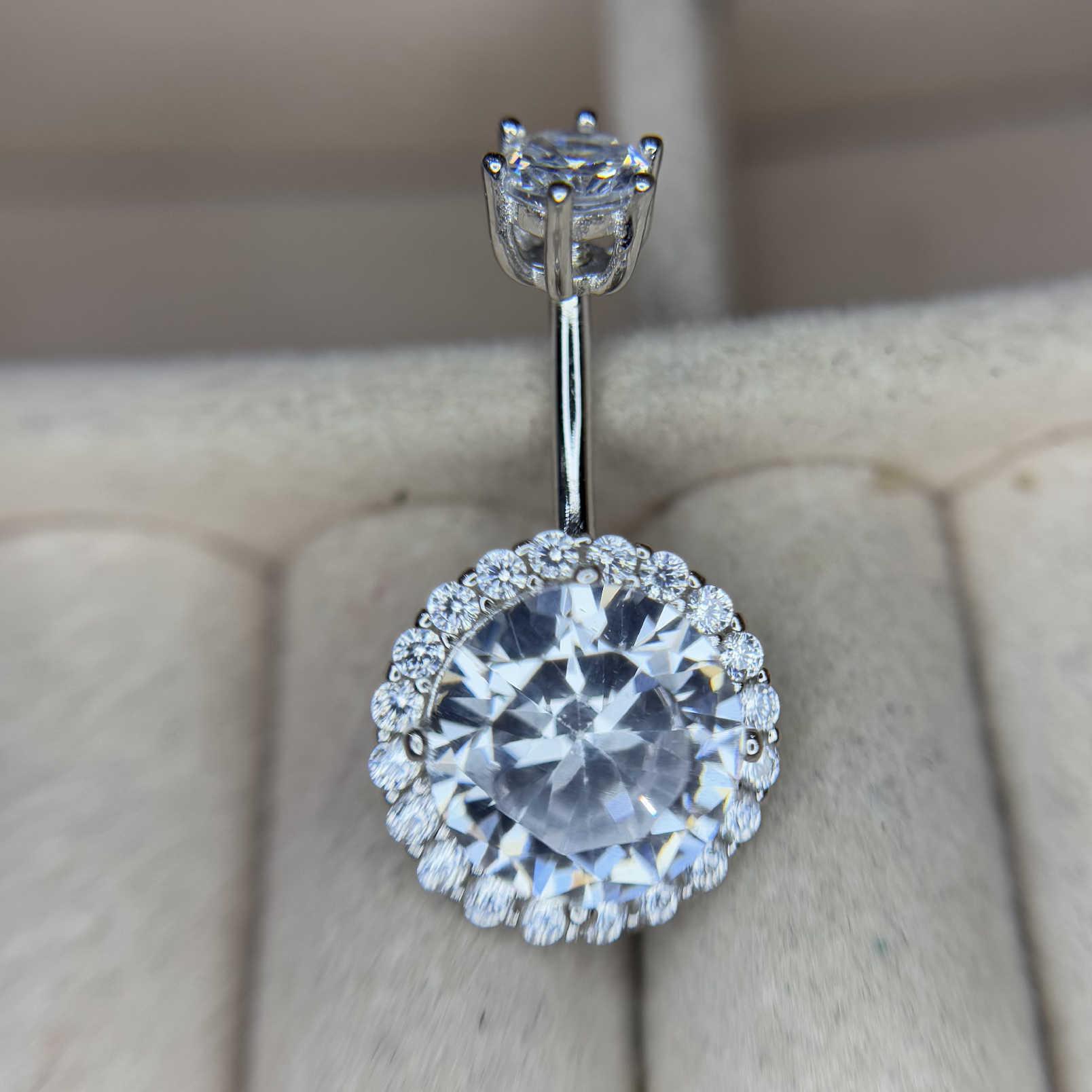 rốn bạc xi bạch kim đá chấu tròn viền kim cương to 