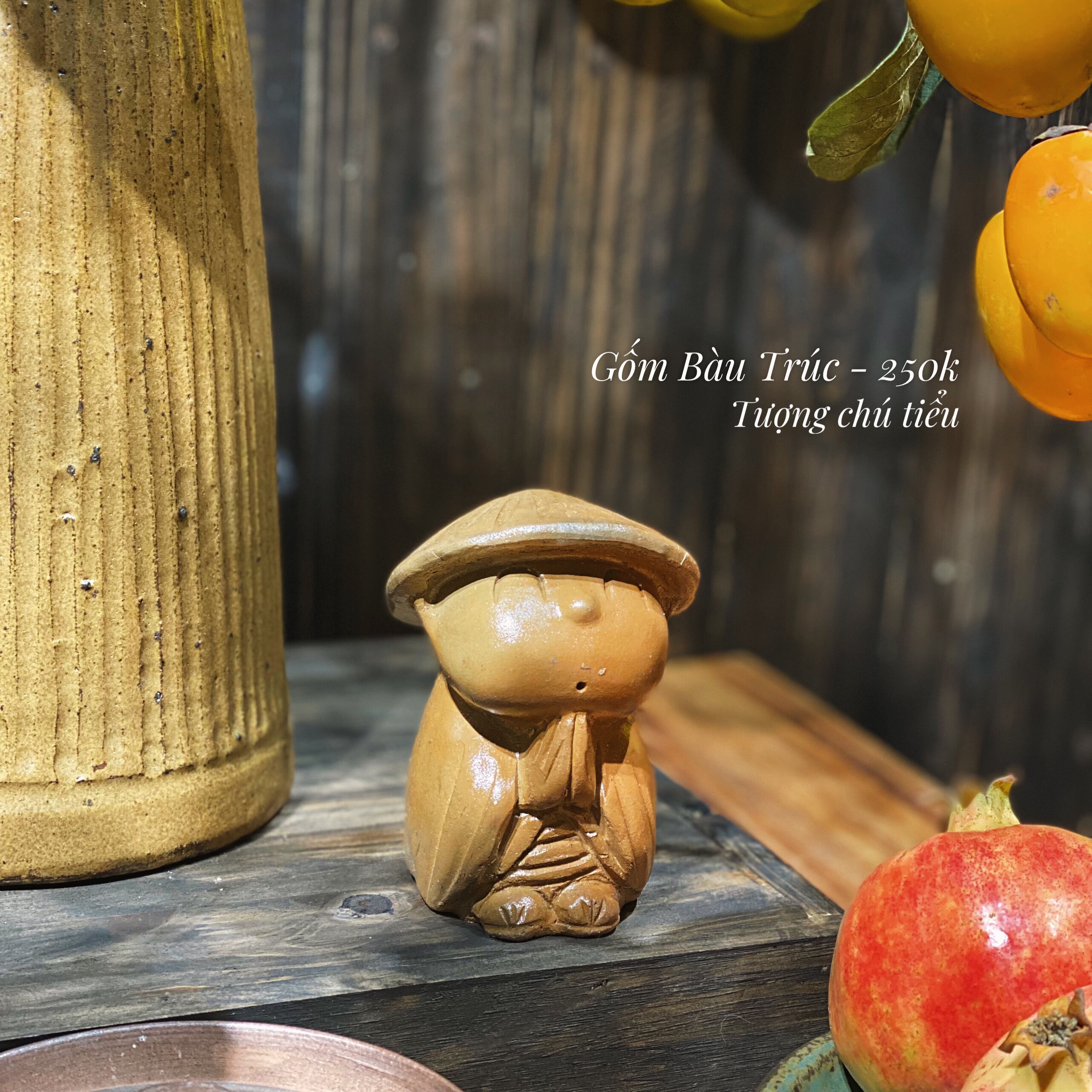 Tượng chú tiểu đi mưa gốm Bàu Trúc_thumbnail_2