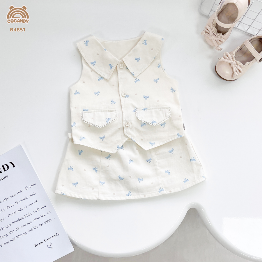 Bộ cộc kaki BE sát nách họa tiết nơ xanh