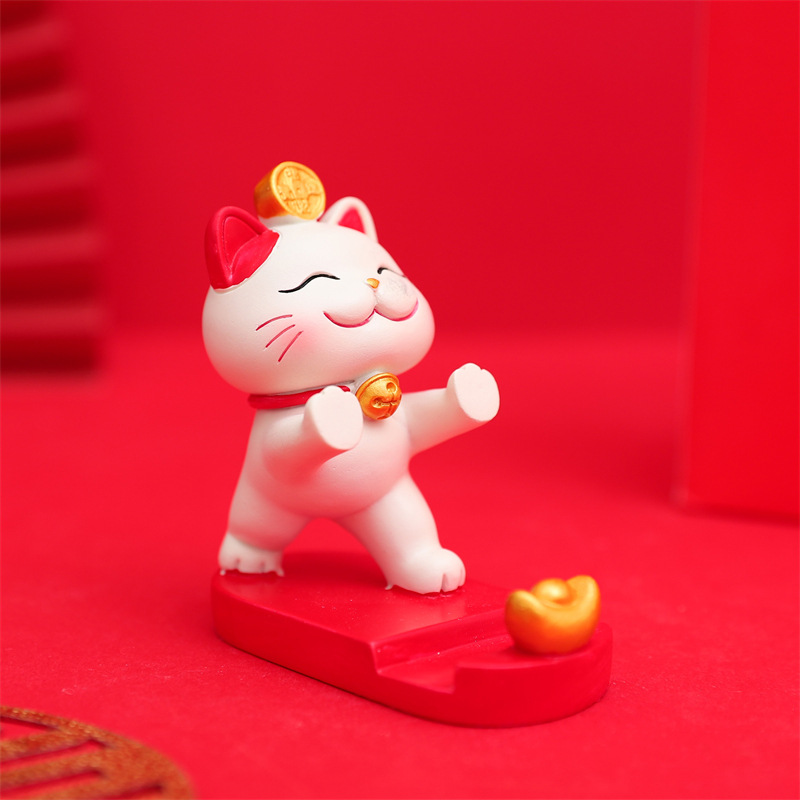 Mèo đỡ điện thoại