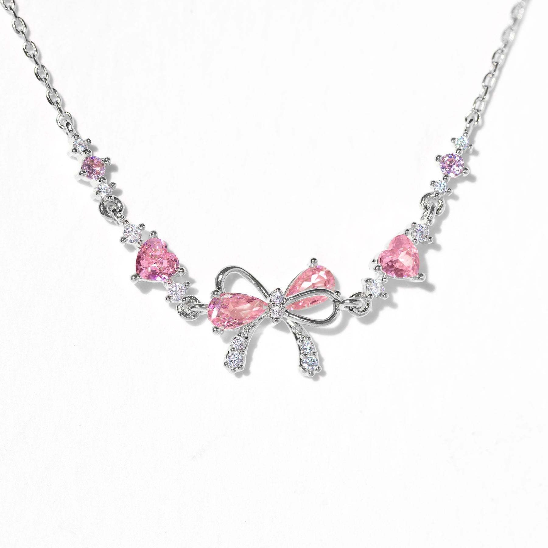 Dây chuyển Charm nơ đính đá trái tim_thumbnail_1