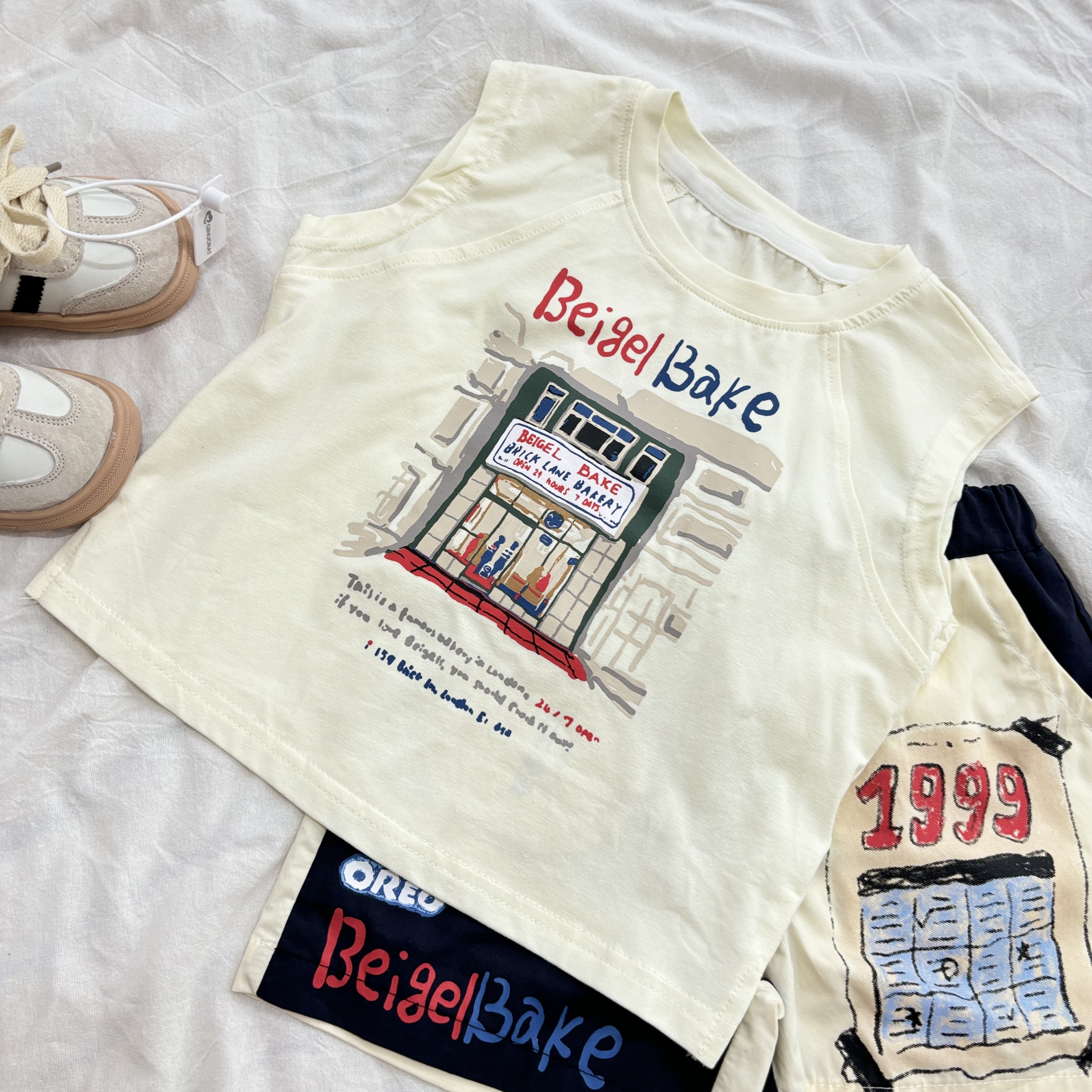 (A20) Áo ba lỗ chất thun mềm họa tiết in Beigel Bake thời trang bé trai mẫu hè 2025 QCCC_thumbnail_4