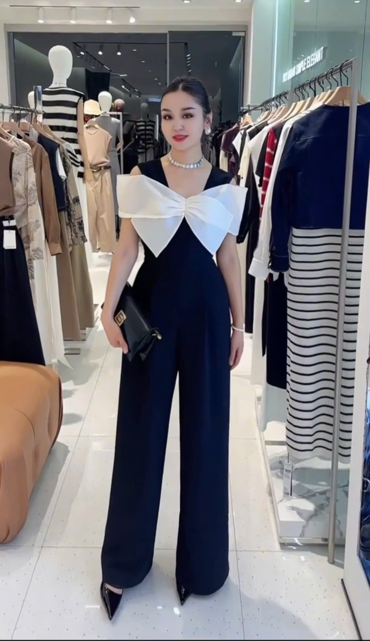 Jumpuit dài thiết kế phối nơ quần ống rộng Phong Cách