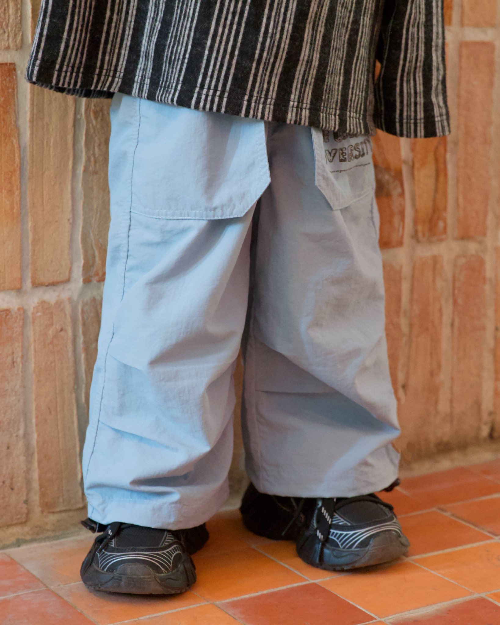 Quần gió mềm dây rủt gấu