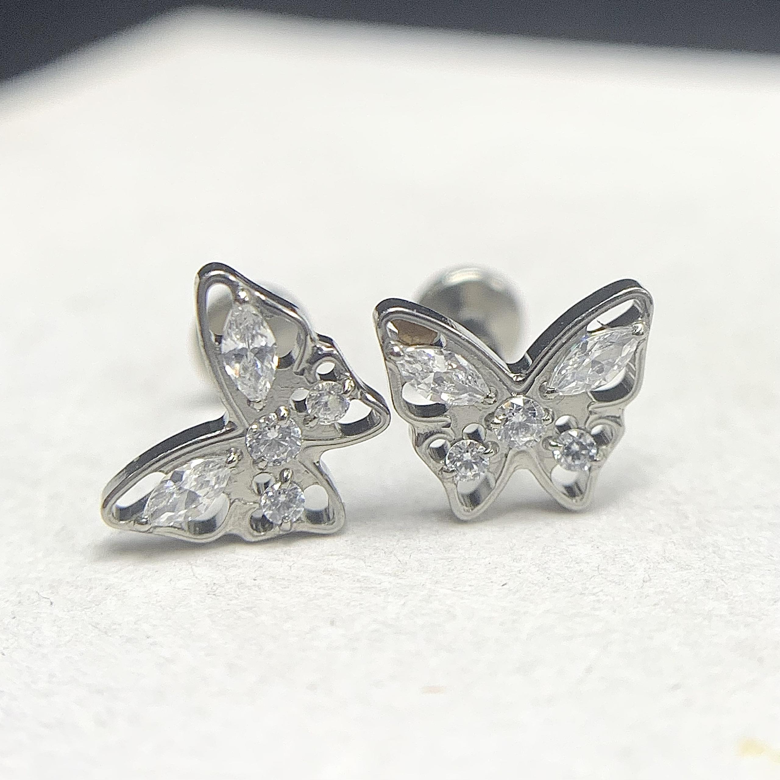 Khuyên kiểu titan bướm trơn ít đá