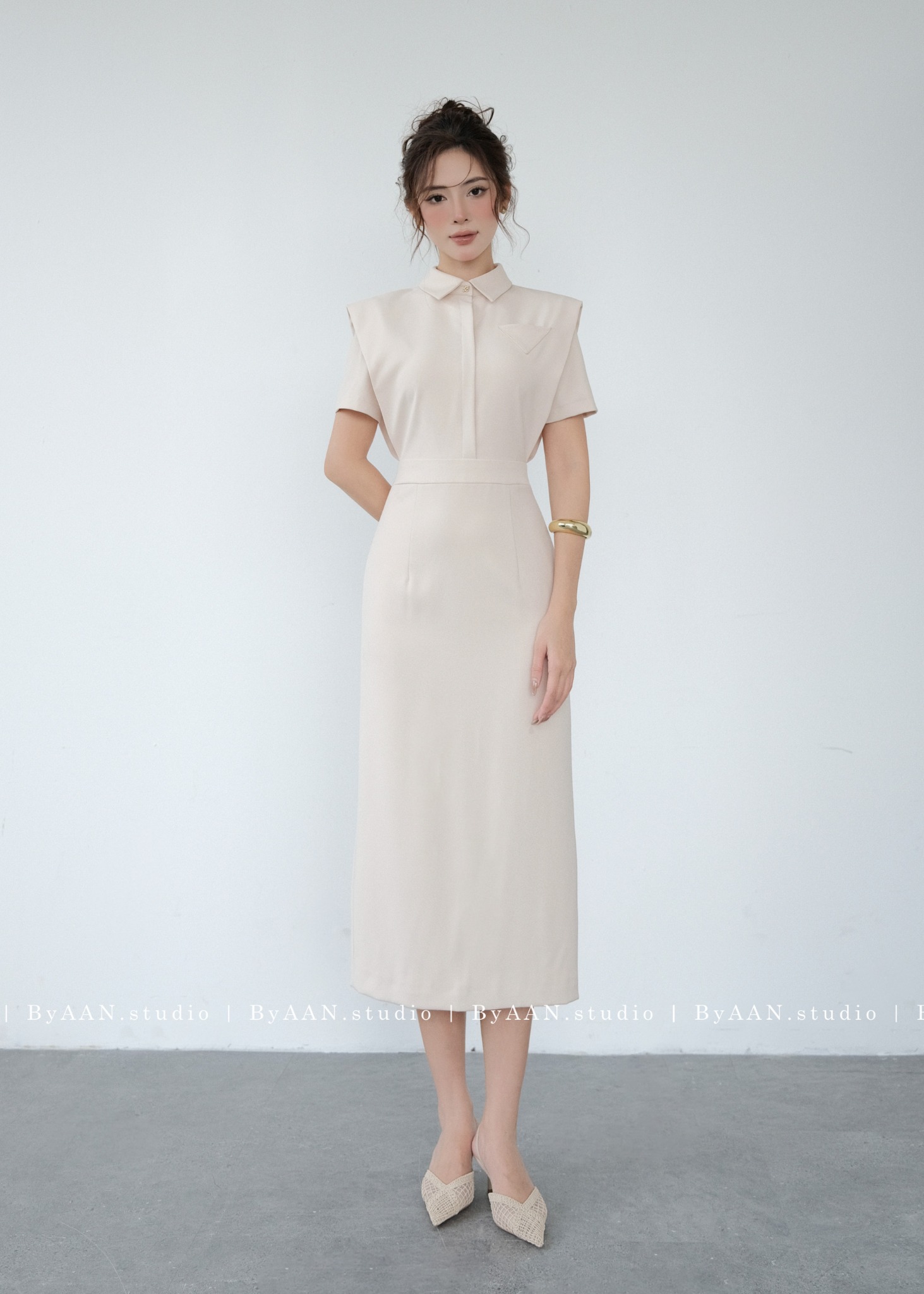 Váy liền phủ vai phối cổ đức cúc tim