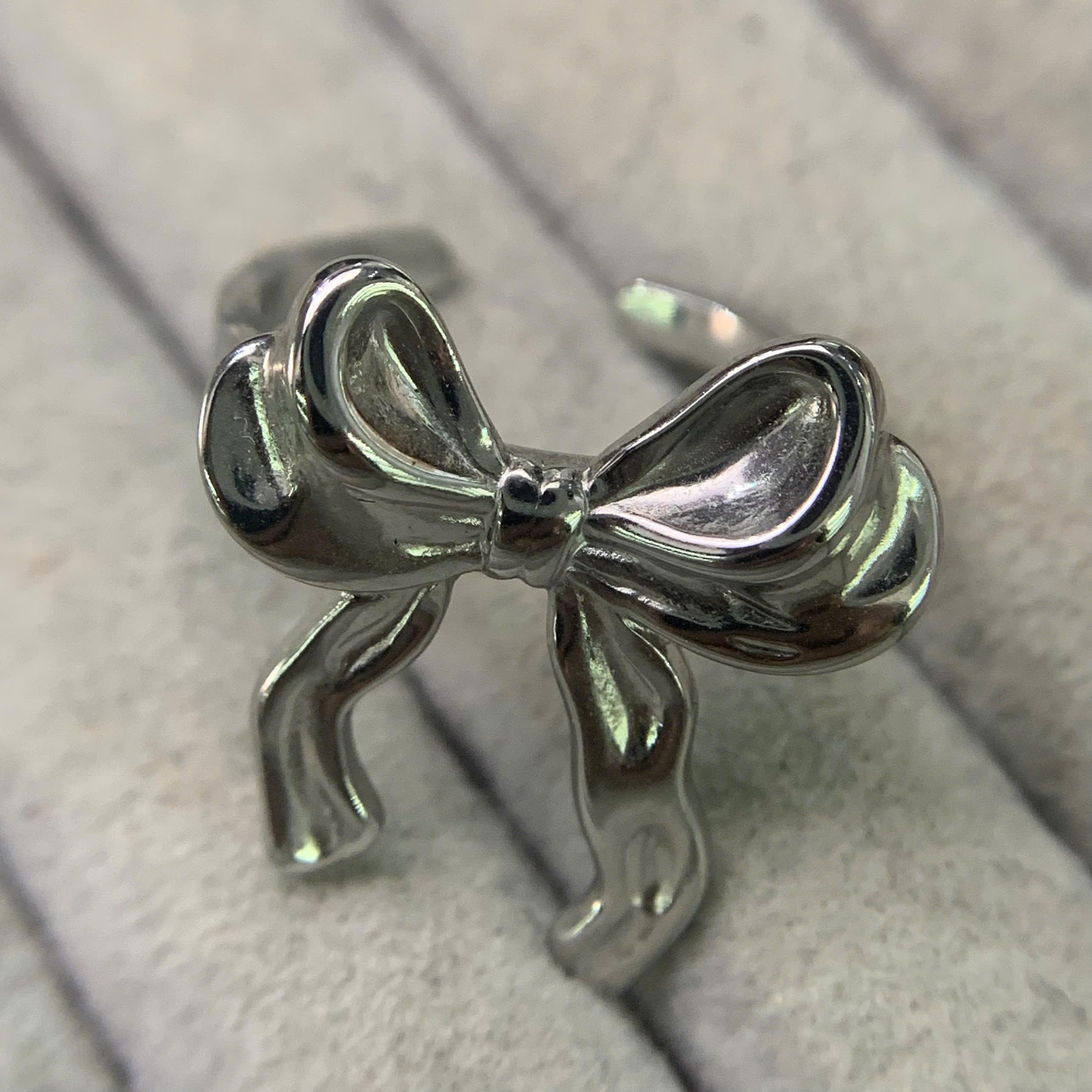 nhẫn kiểu titan nơ bạc to ruy băng hở freesize 