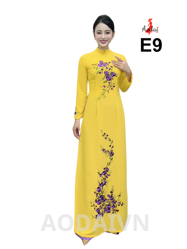 Áo dài thêu E9 Lụa Tằm Ý màu vàng cổ cao 2cm tay dài thêu hoa tím