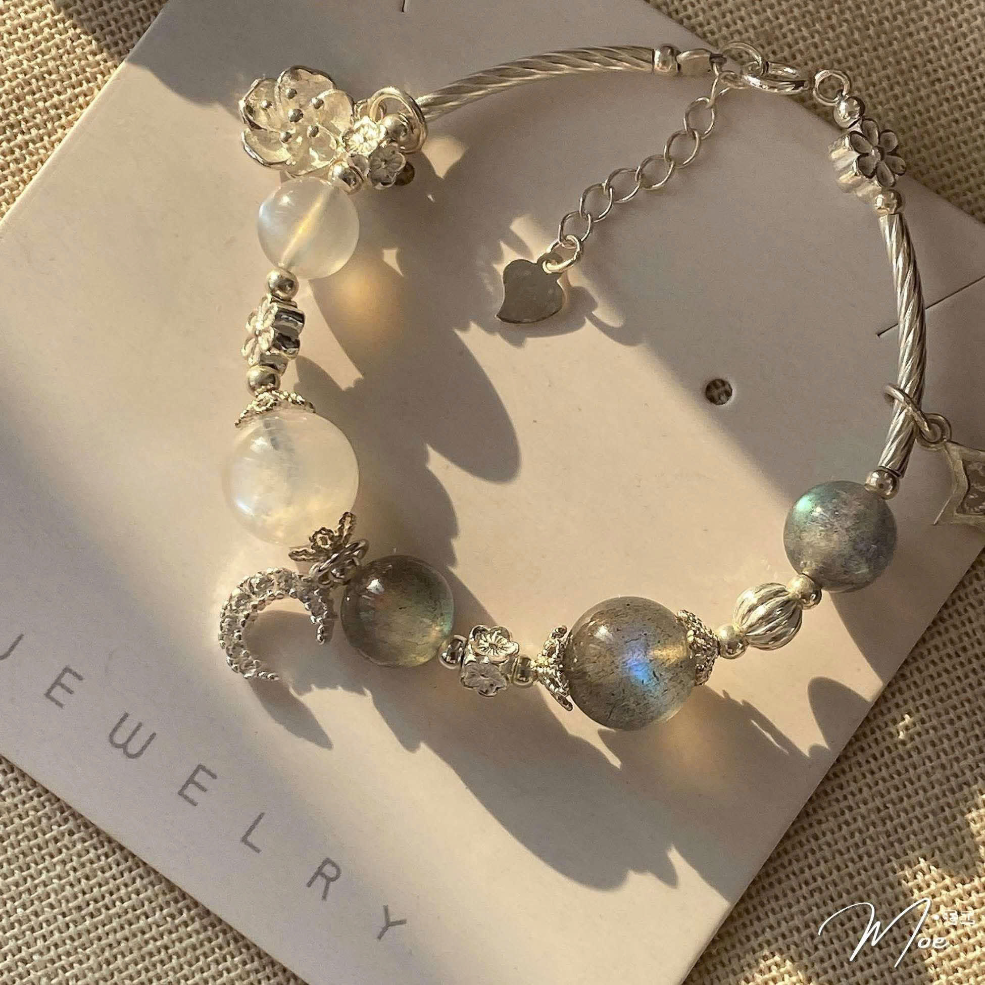 PT216 - Lắc tay xà cừ hoa mai