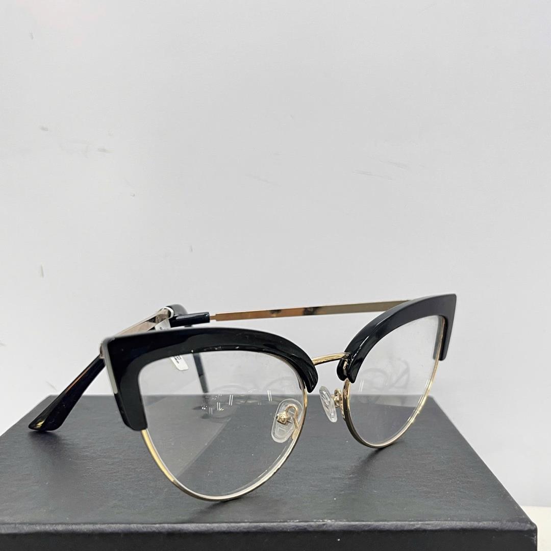 kính mắt mèo gọng kim loại mix đen vàng.