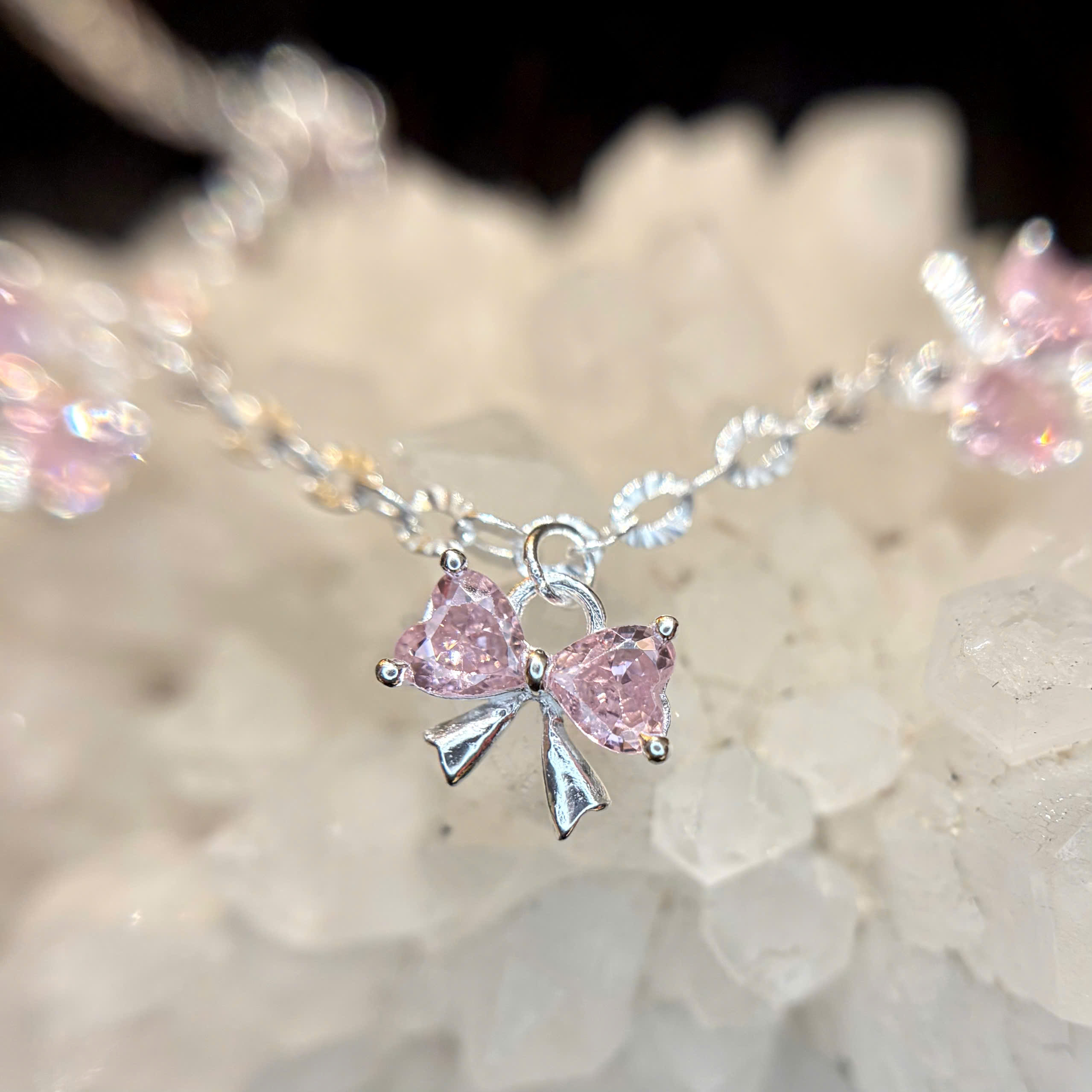 Vòng tay bạc xi kim nơ tim hồng