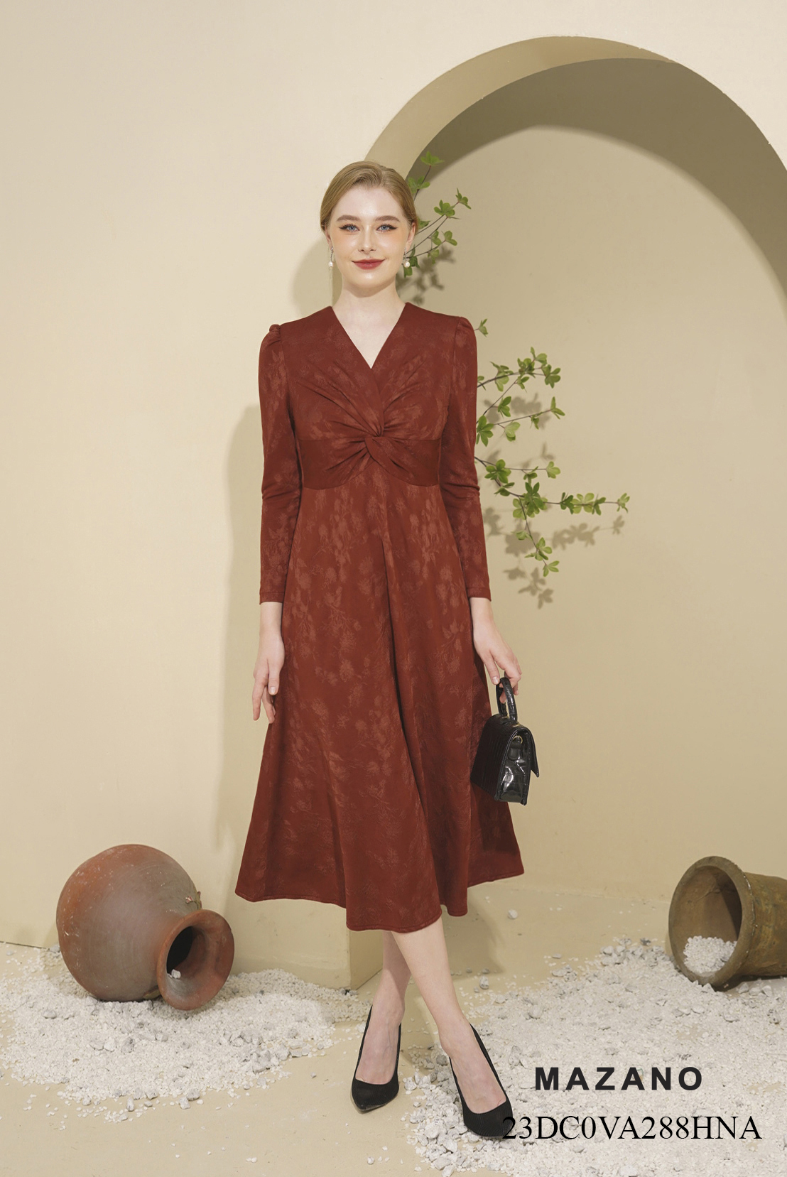 Đầm len xoắn ngực chân A rủ