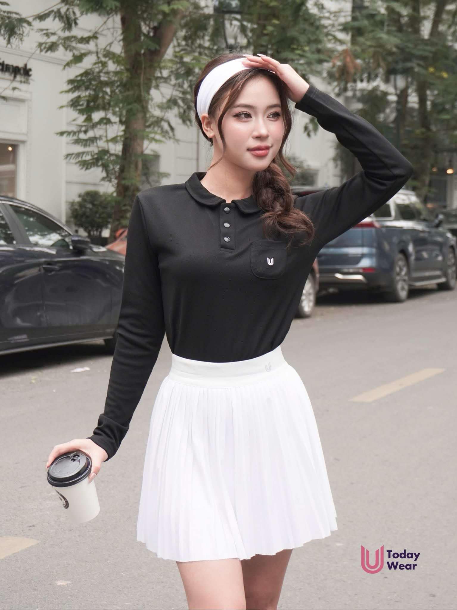 Áo Ferry dài tay đen mix chan váy xếp ly Meli trắng_thumbnail_0