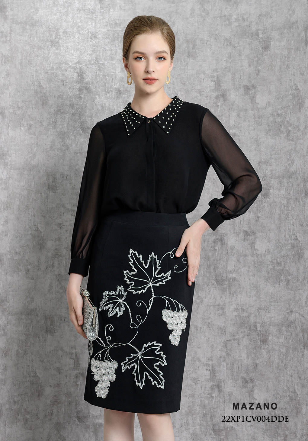 Chân  váyJuyp vải Tuytxi len màu đen thêu họa tiết bố cục