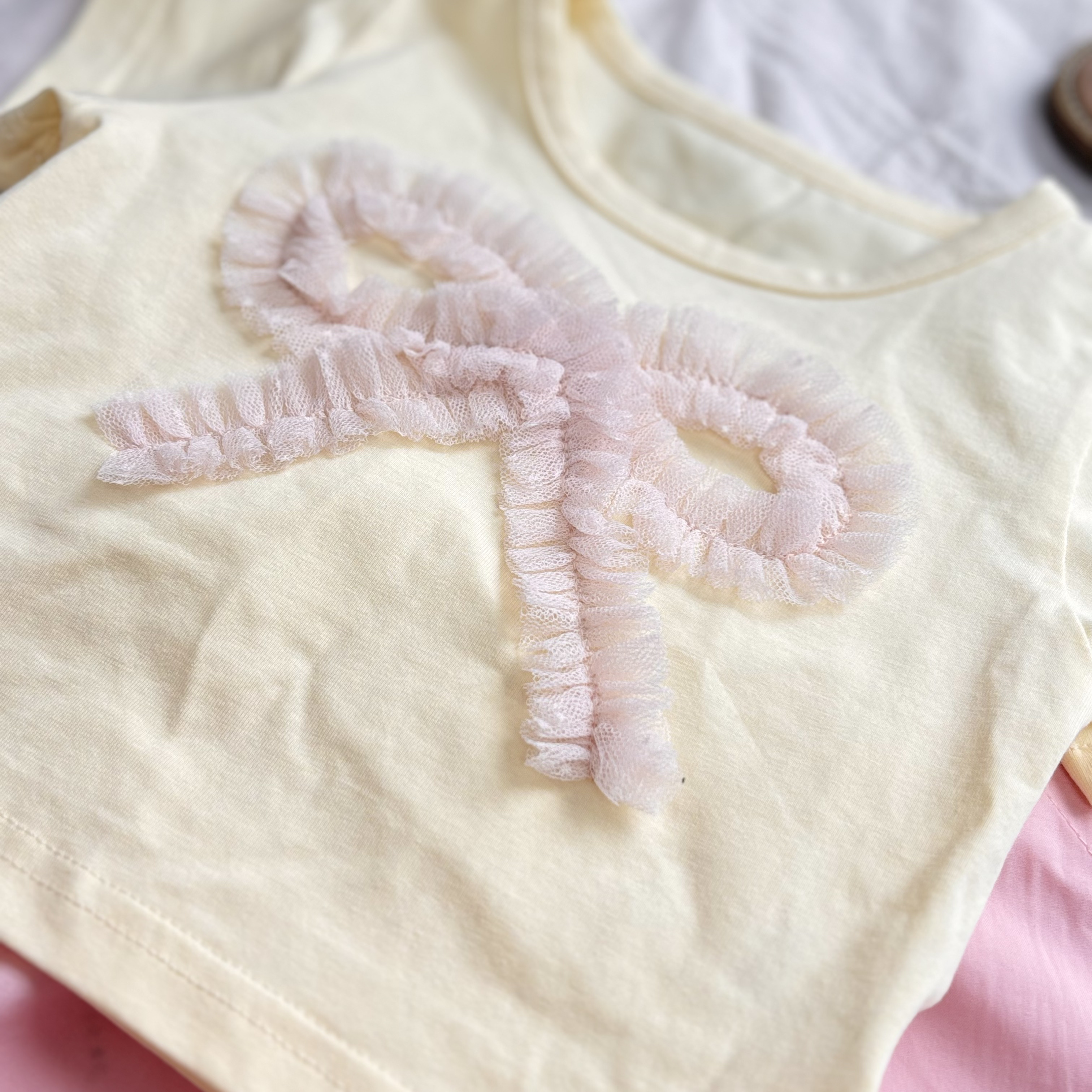 (A13) Áo thun mềm họa tiết đáng yêu màu vàng QCCC mẫu hè 2025_thumbnail_2