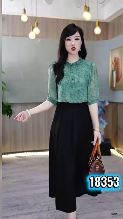 18353-Đầm xòe phối 2 màu xanh đen tay lở cách diệu (voan, lụa,lót)