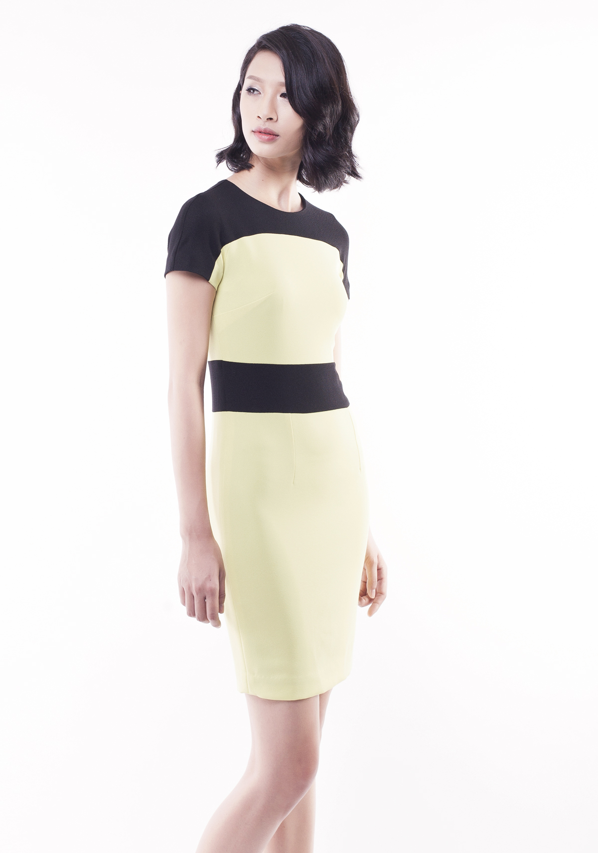 Đầm thân ôm phối vàng đen