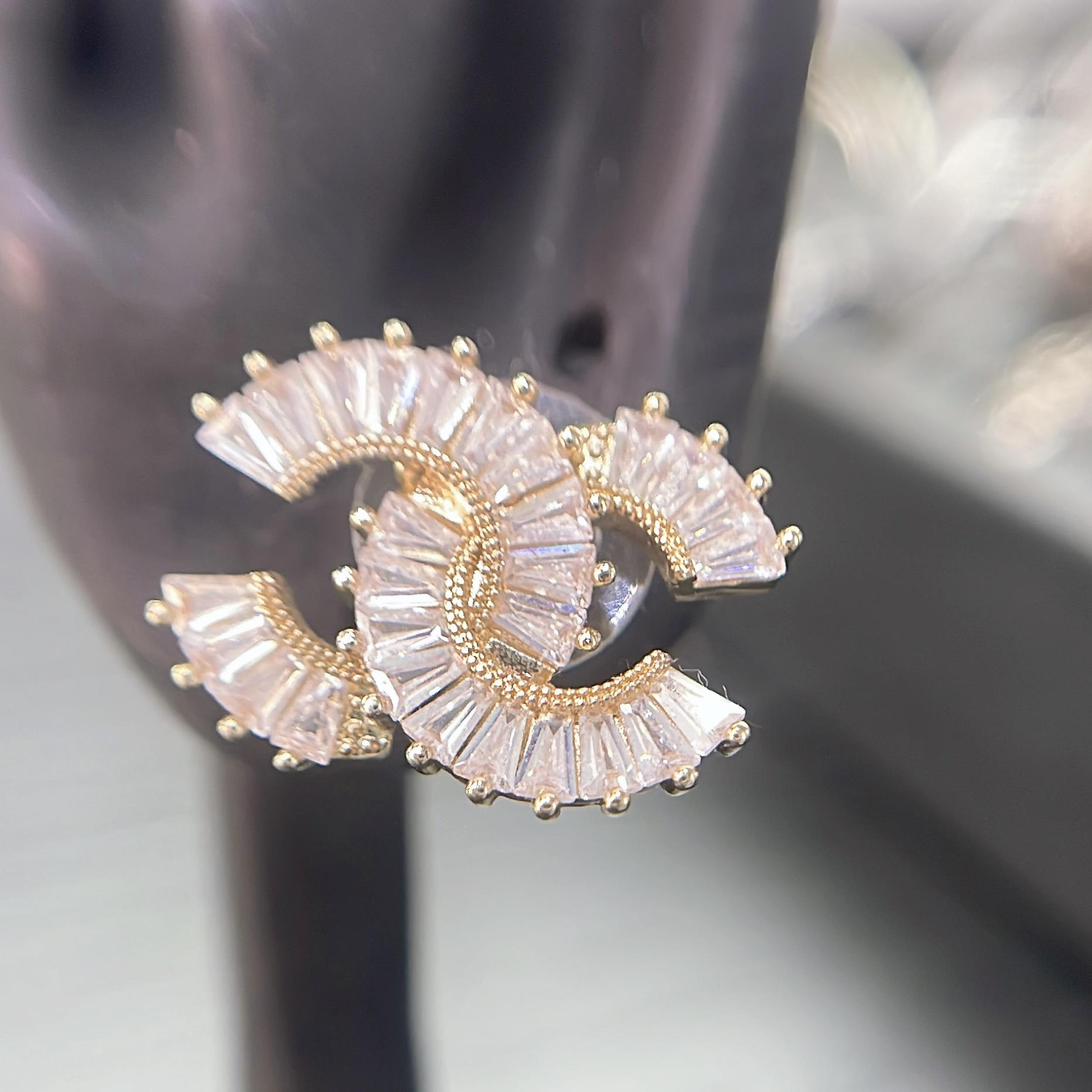 Khuyên kiểu cặp cn vàng đính đá 