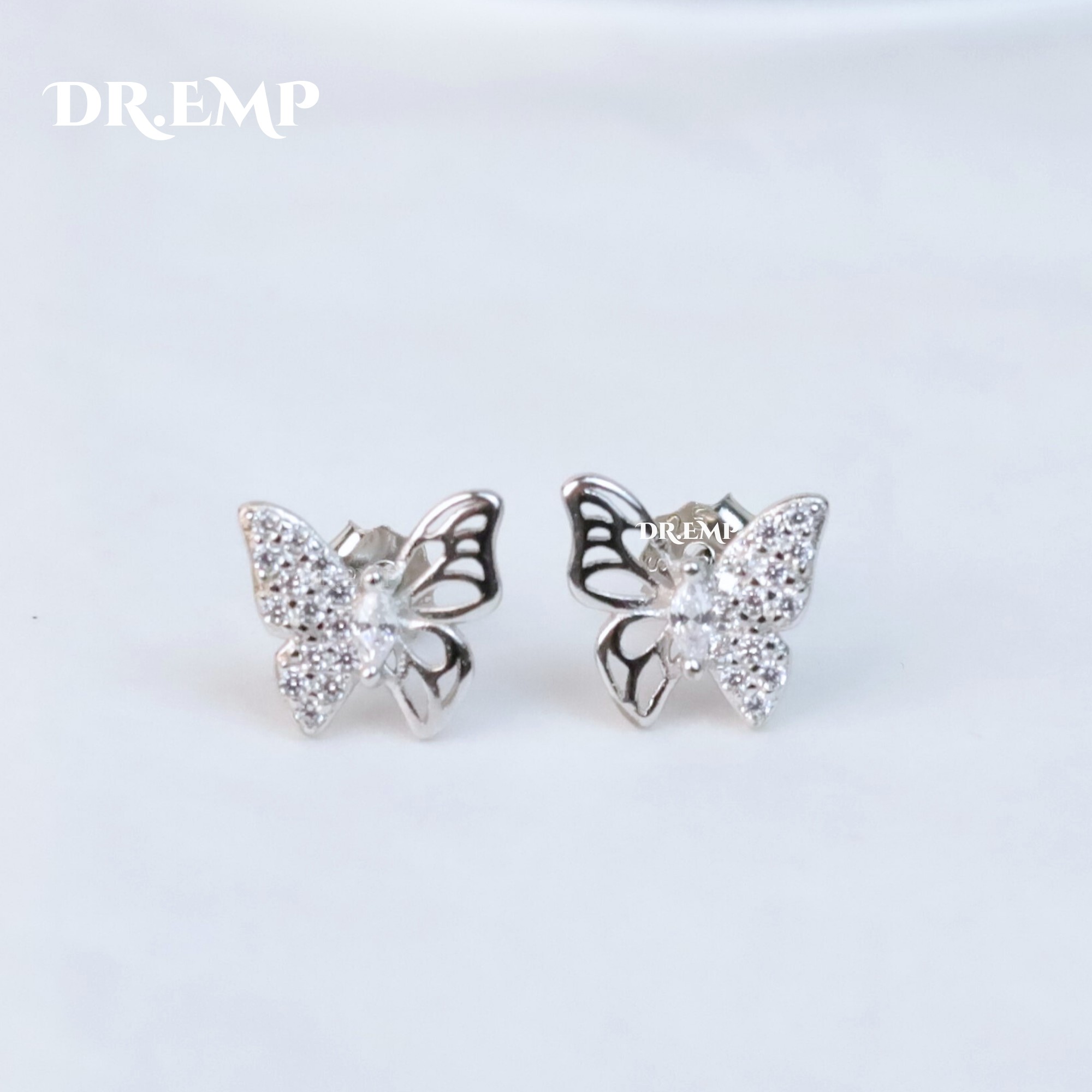 Khuyên kiểu bạc xi bạch kim bướm nửa đá