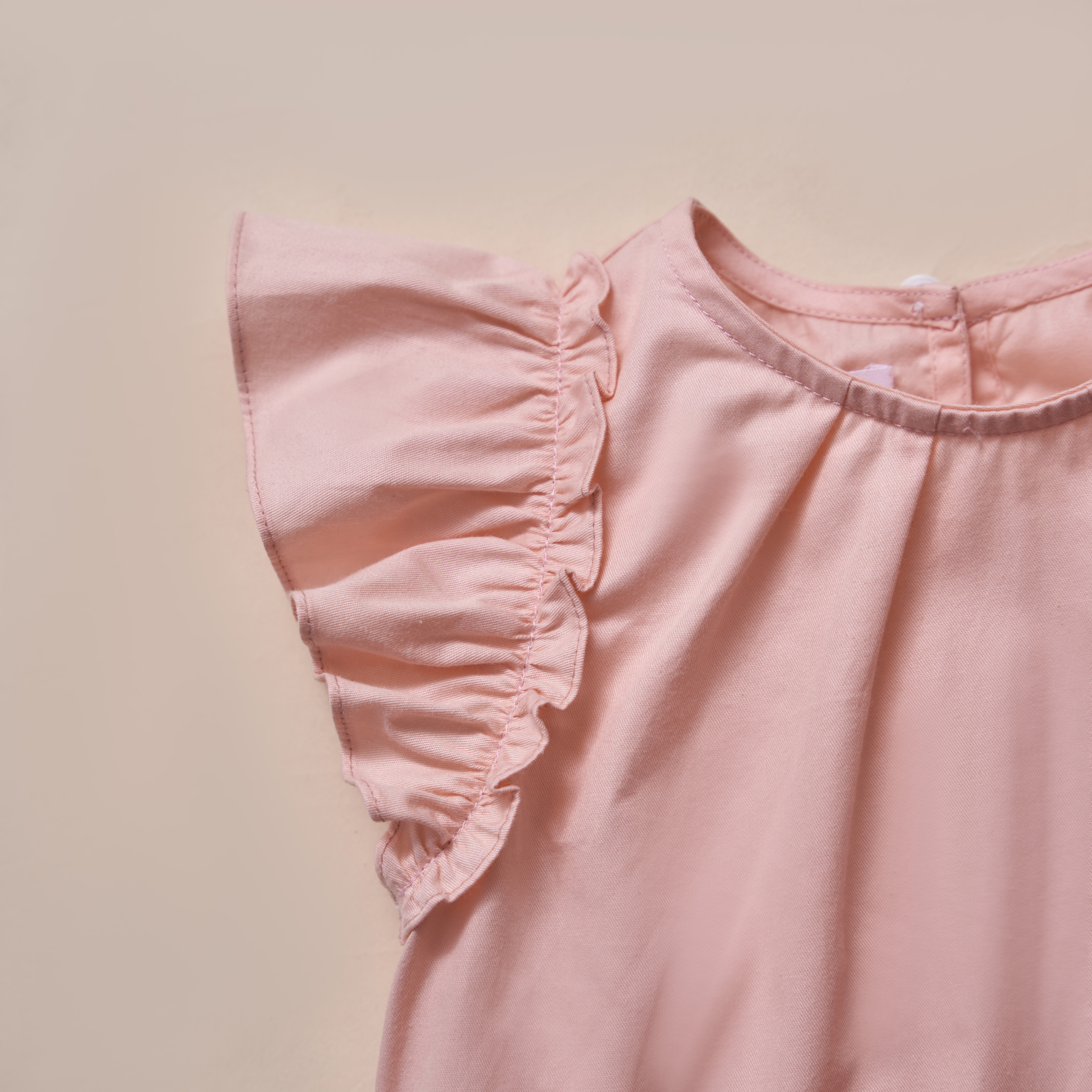 Áo thô xếp ly tay bèo cánh tiên