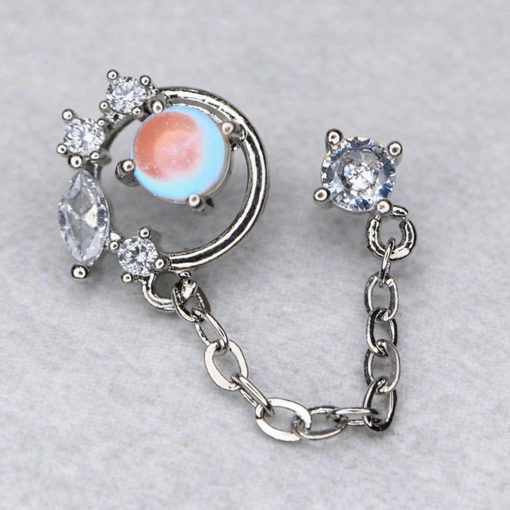 Khuyên kiểu xích mặt đá vàng trắng kim cương.