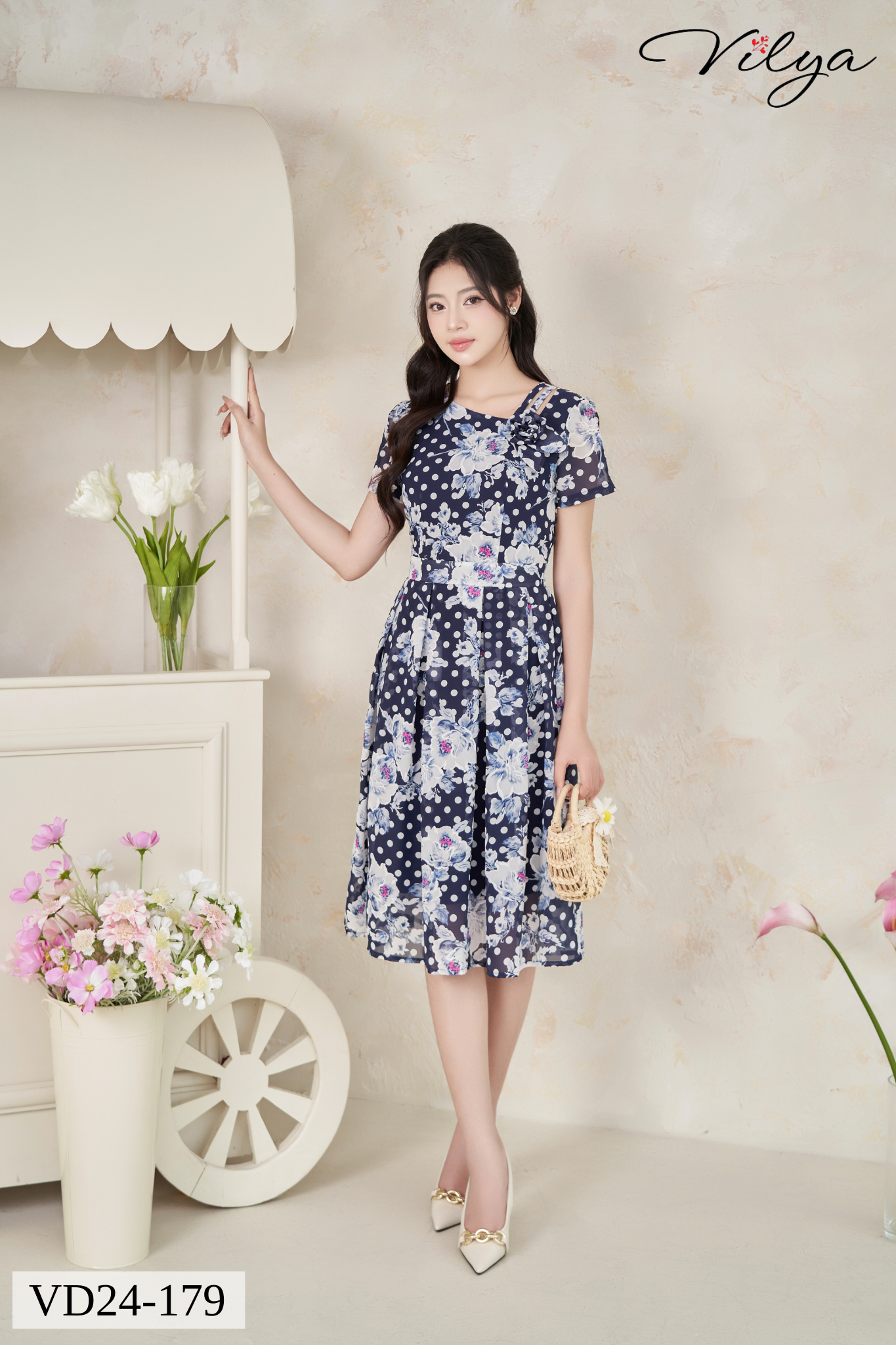 Đầm chấm bi tím than xòe xếp ly