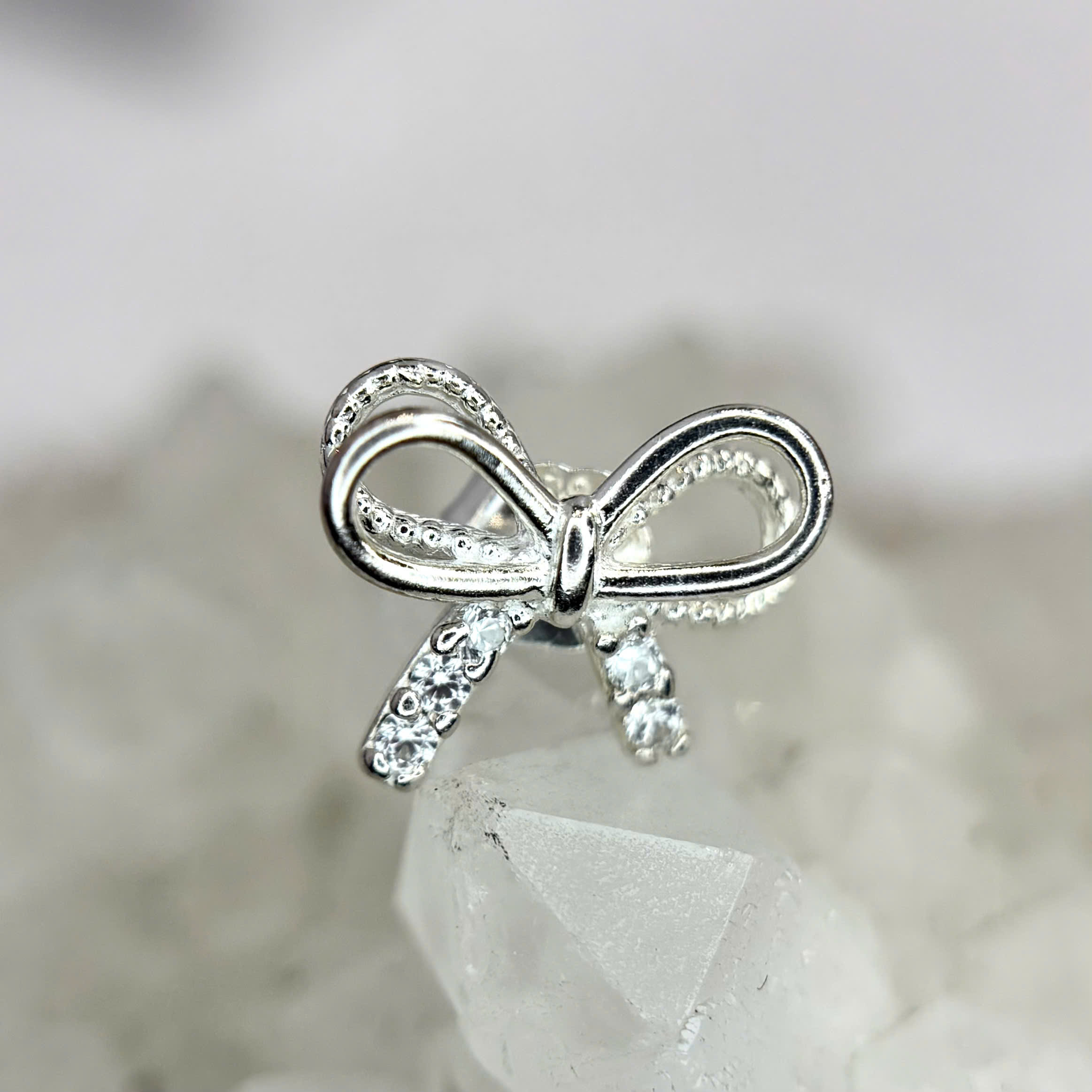 Khuyên kiểu bạc xi kim nơ lồng_thumbnail_1