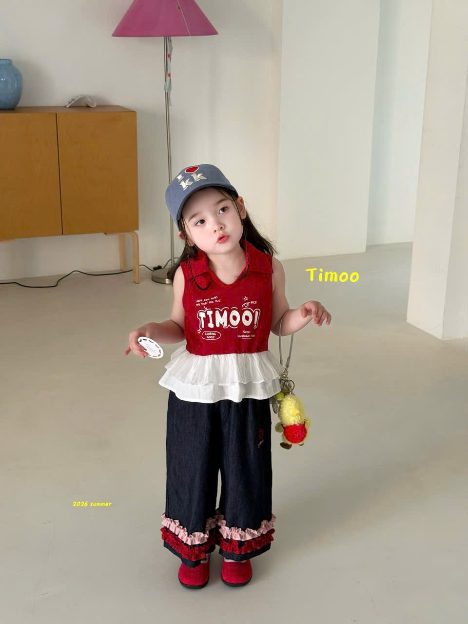 A130 - Áo sát nách chữ Timoo phối bèo hãng Timoo