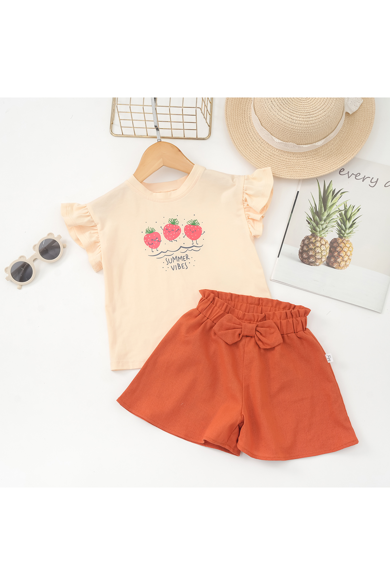 Áo thun in hình phối nơ sau lưng_thumbnail_5