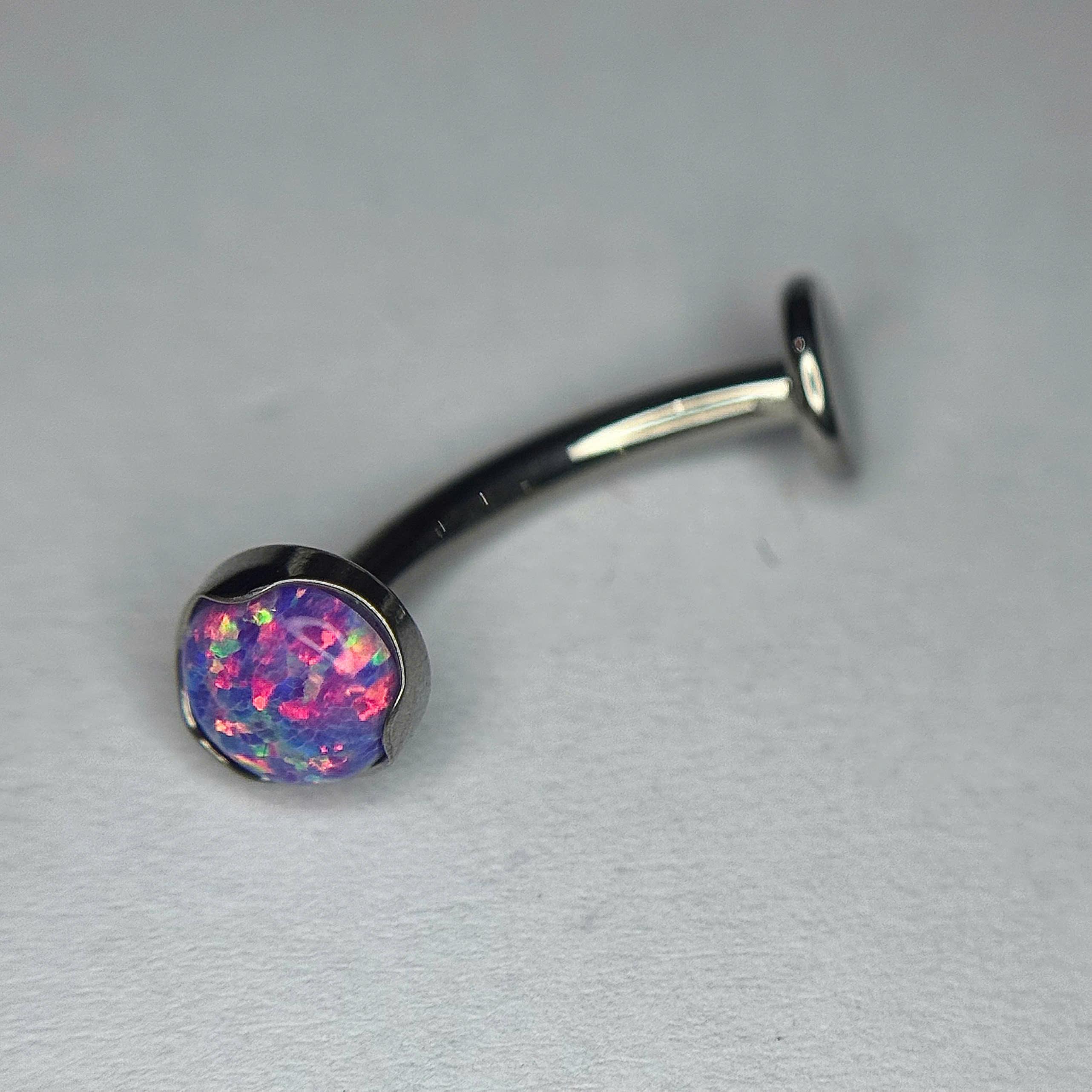 rốn titan đặc biệt đá opal xanh hồng