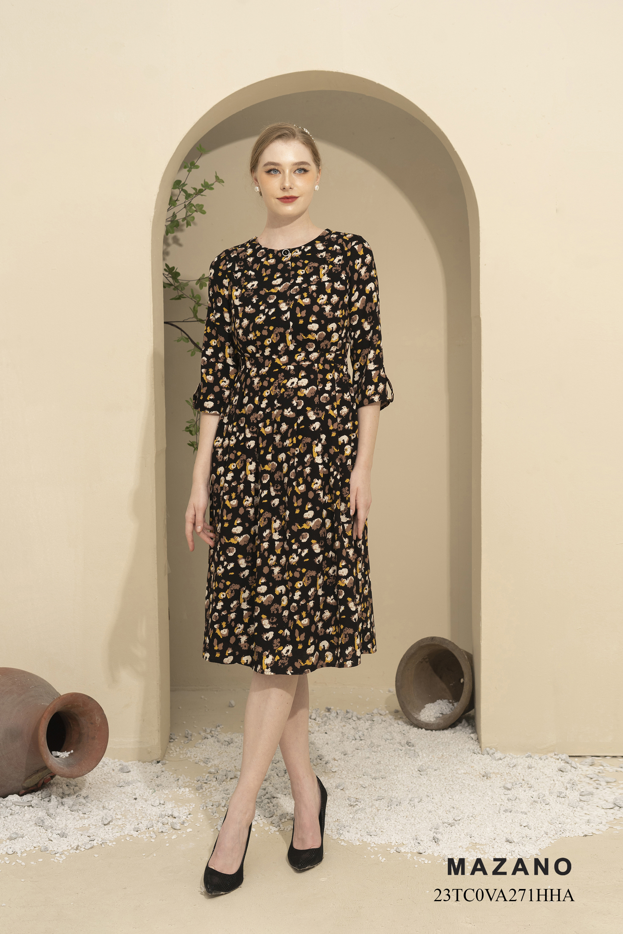 Đầm can eo chân xếp hoa nhí