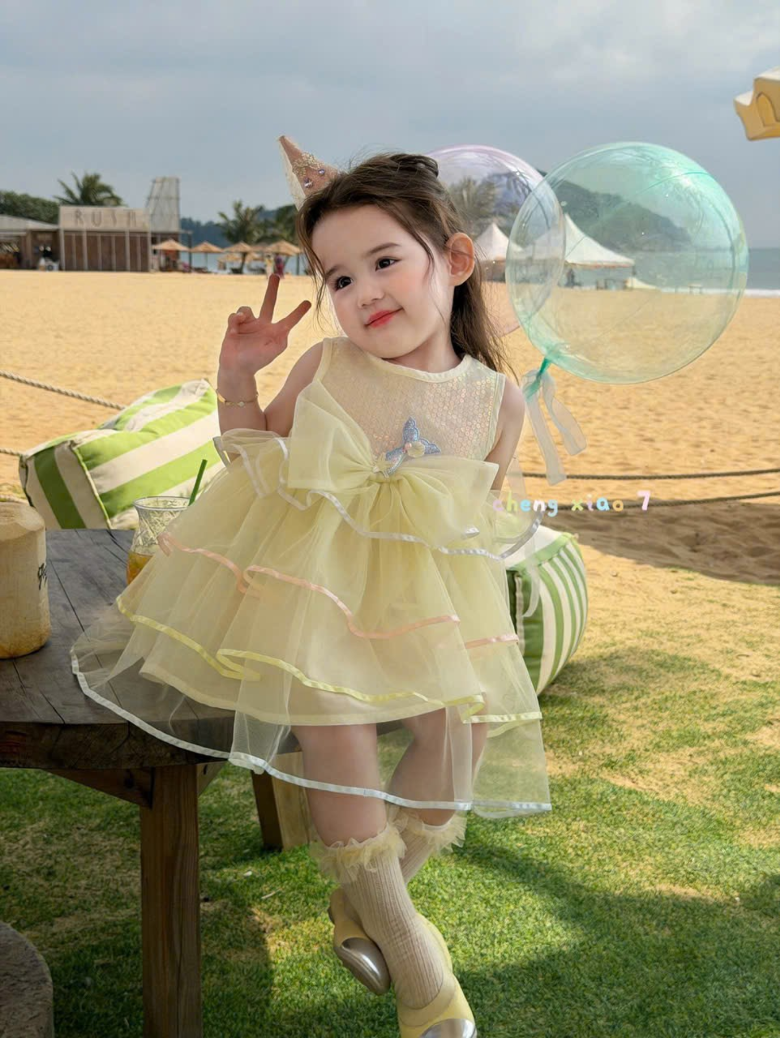 CX22 - Váy voan tầng đính nơ lớn vàng hãng CX7